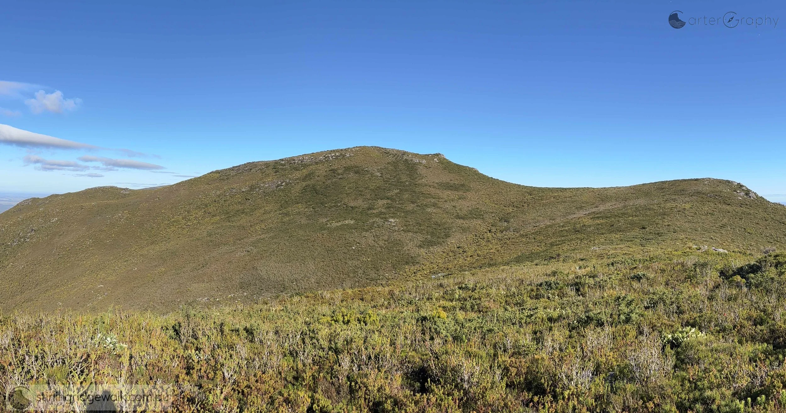 A broad view of the distinctive formation of the Isongerup peaks, with Isongerup South Peak on the left, Isongerup Main Peak dominating the centre, and Isongerup North Peak on the right.
