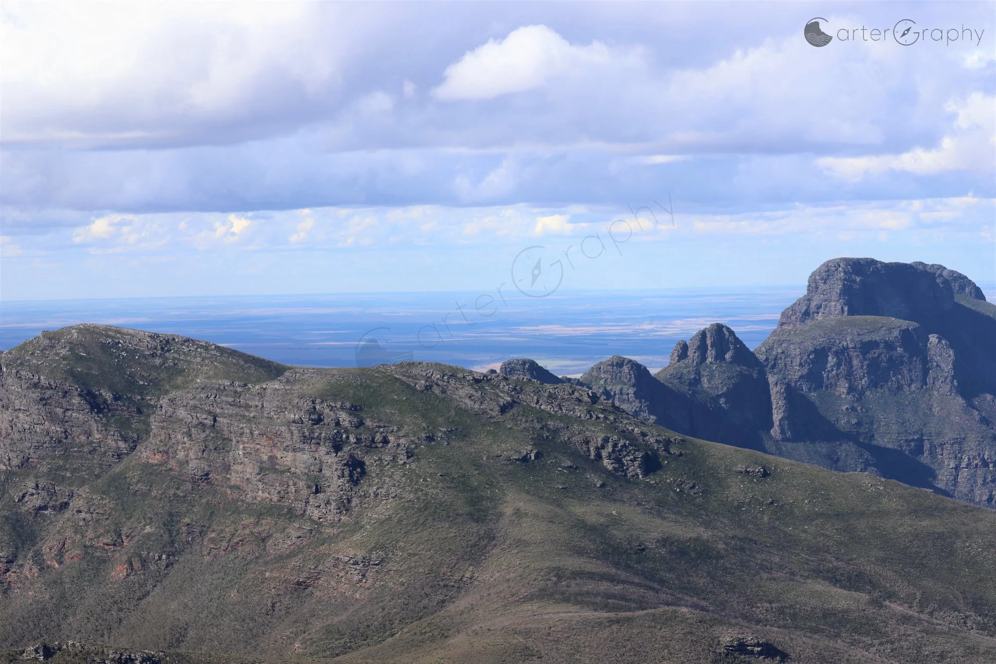 A sweeping view looking ENE from East Peak. From left are Isongerup Main Peak, Isongerup South Peak, 1st Arrow, 2nd Arrow, 3rd Arrow, Baker’s Knob, Pyungoorup Peak and Ellen Peak in the background.