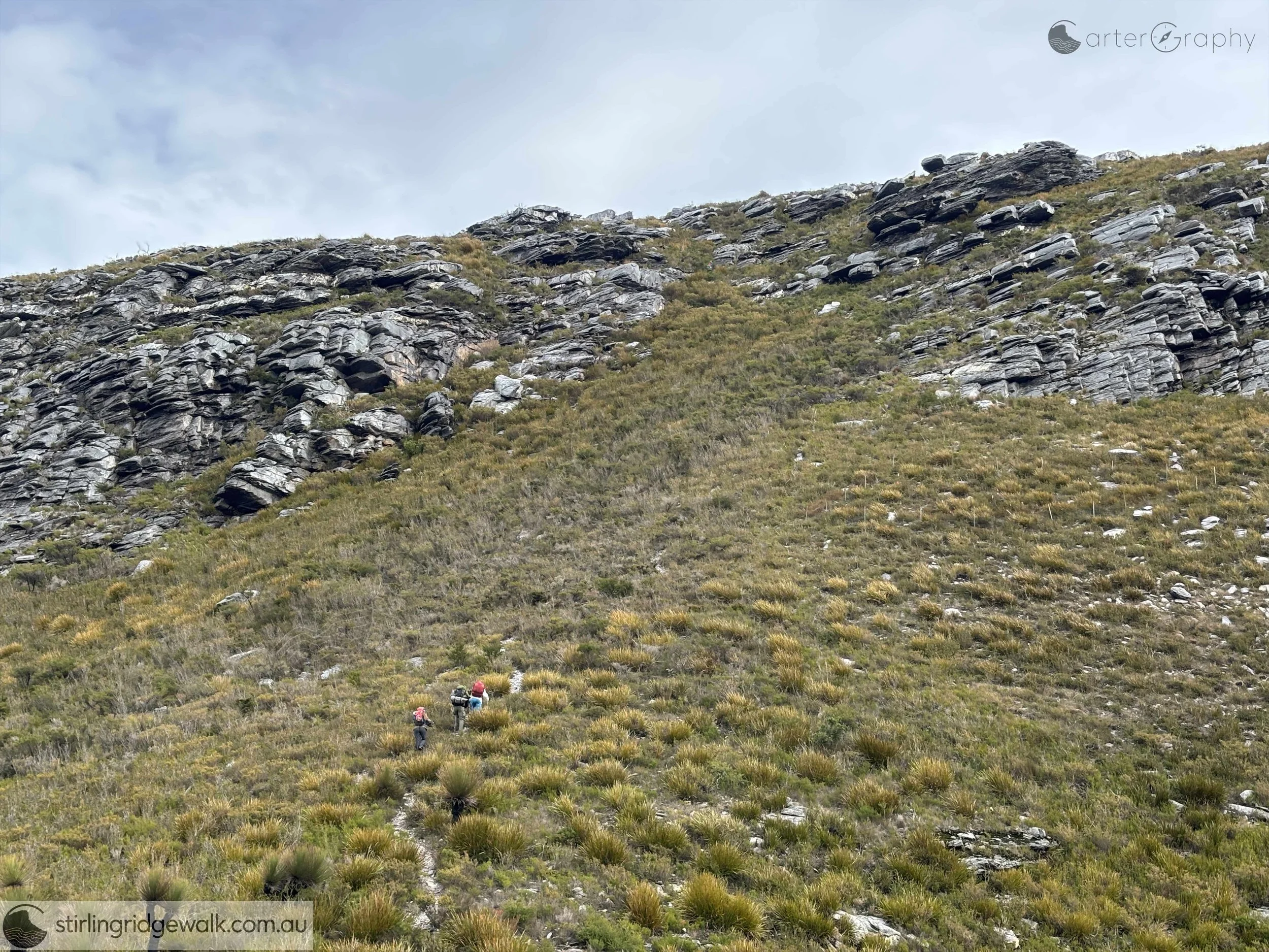 Taken from saddle between East Peak and  East Bluff, shows walkers ascending to East Bluff.