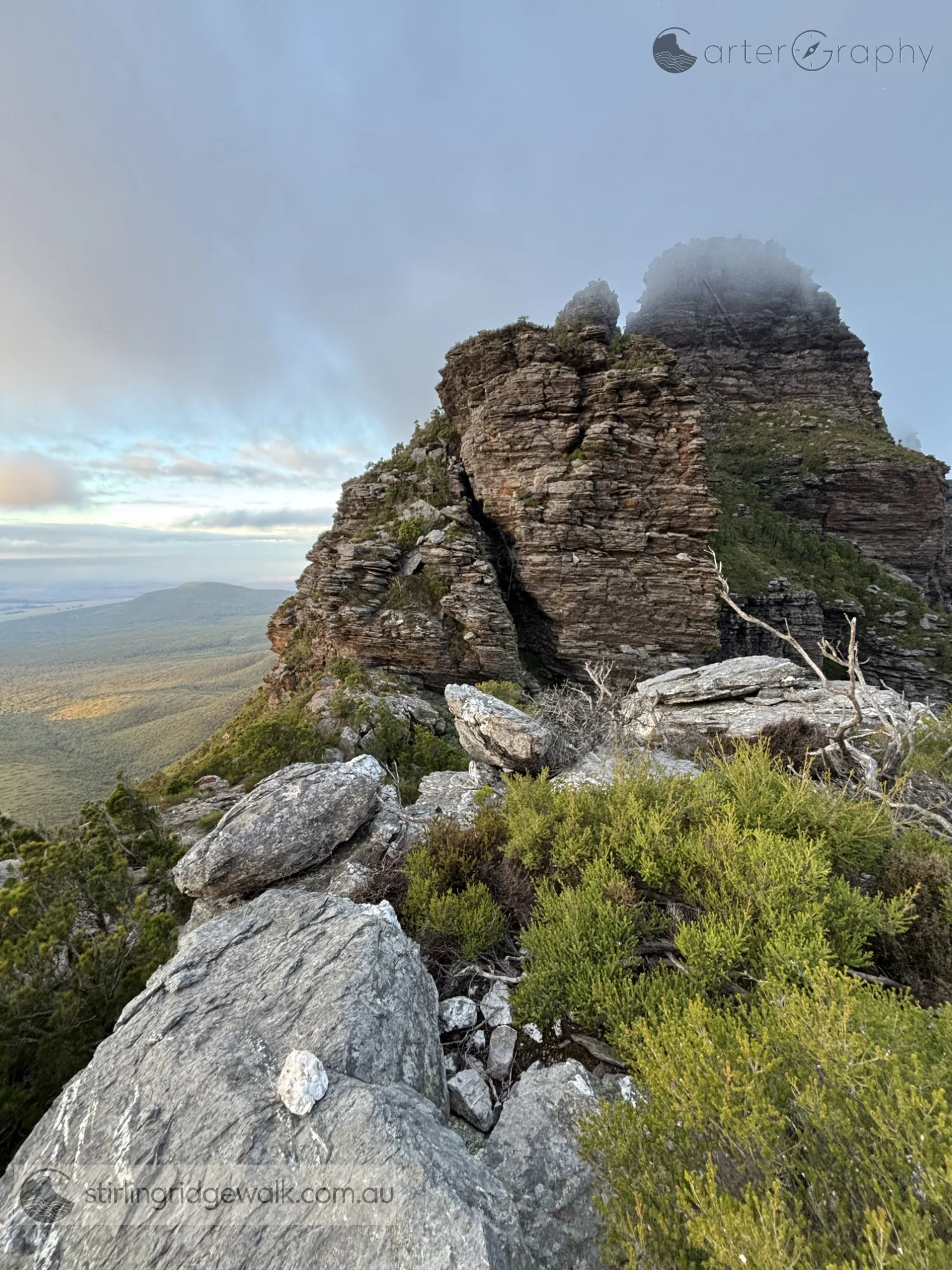Looking towards 1st Arrow from the top of the Rock Castle, with the summit rising through low cloud in the background.
