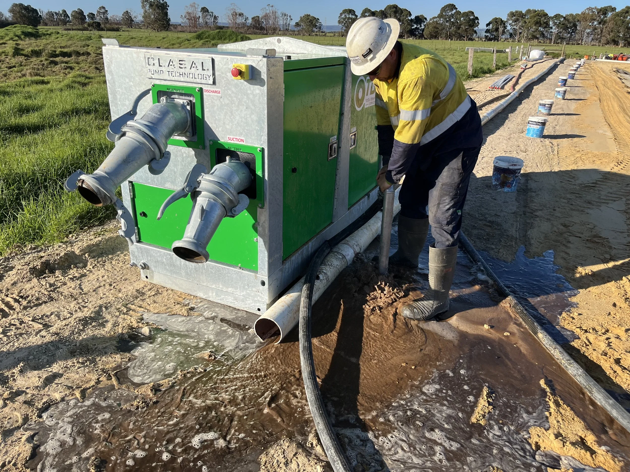 TDS technician operating a wellpoint dewatering pump on a construction site in Western Australia