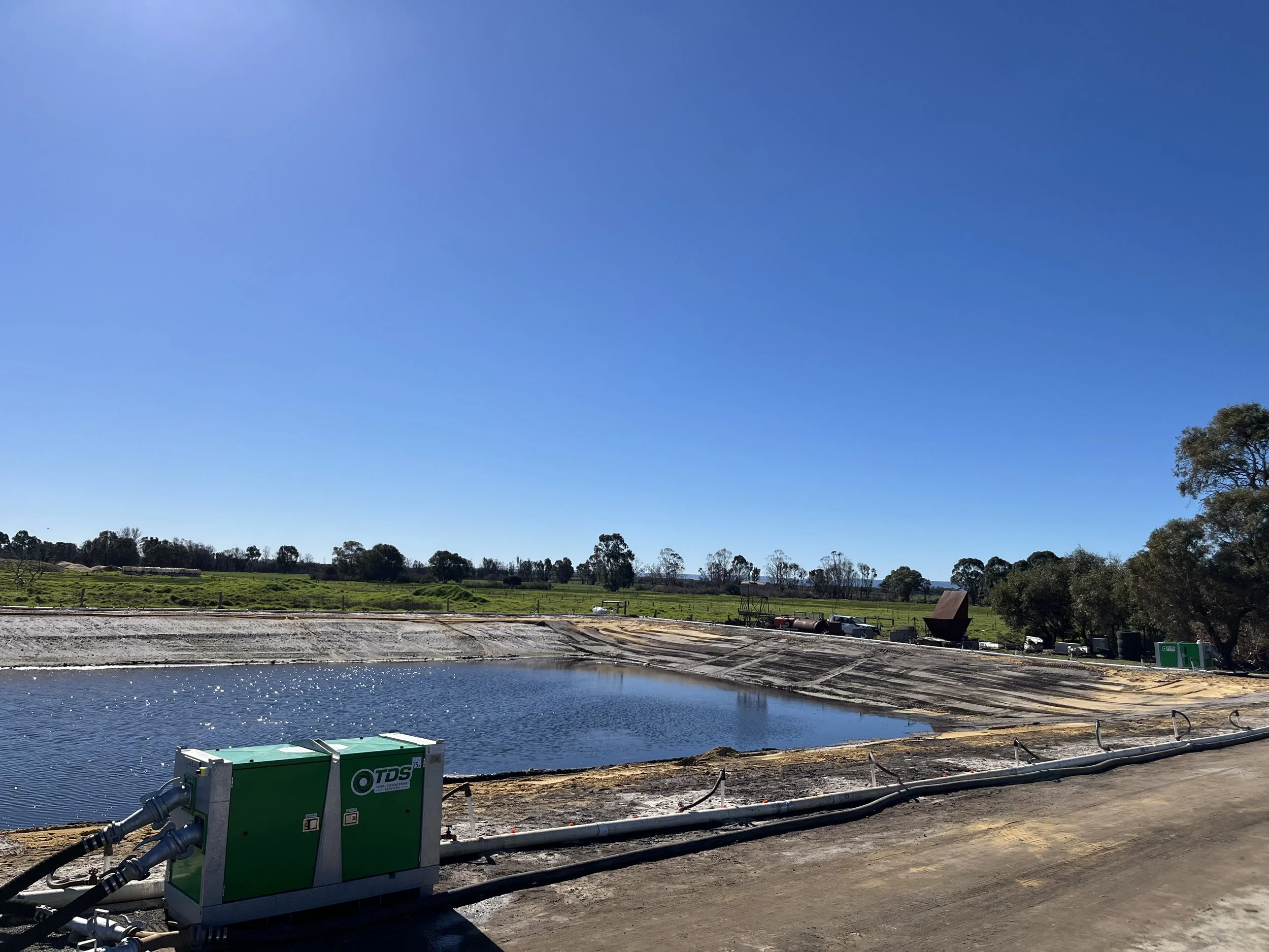 Two TDS wellpoint dewatering pumps connected to header pipework on a Western Australian project site