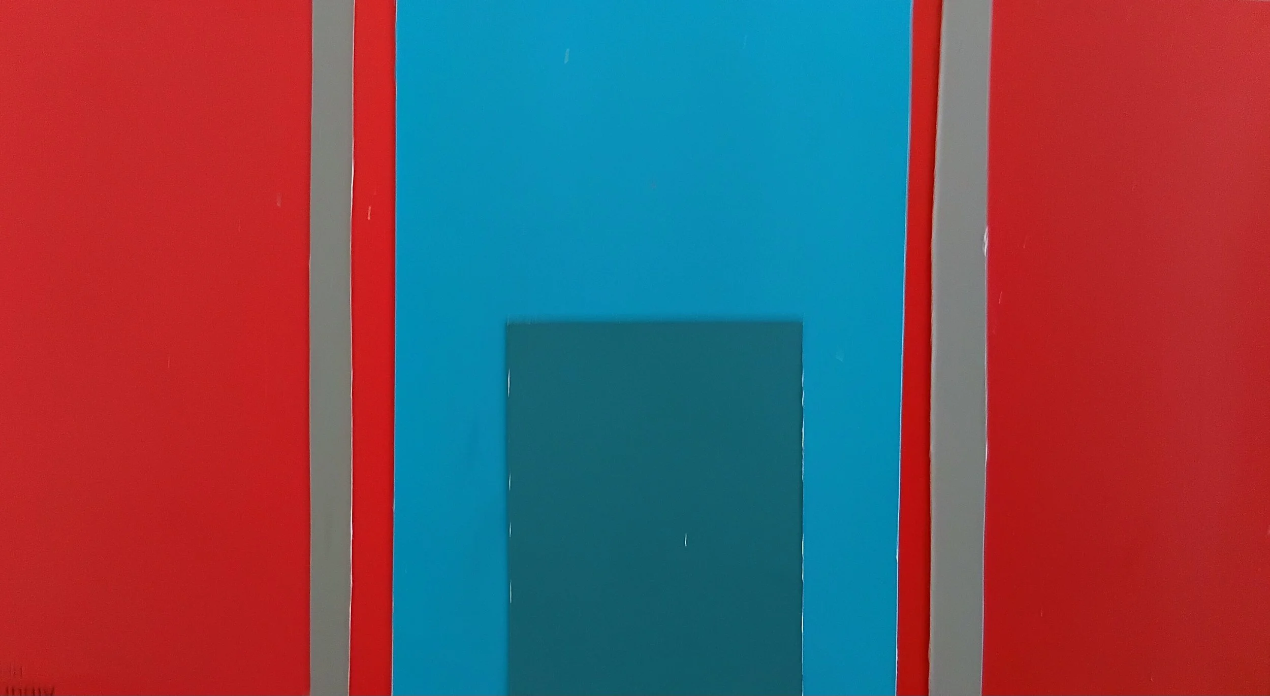 Close-up of colorful abstract art with red, blue, and gray geometric shapes.