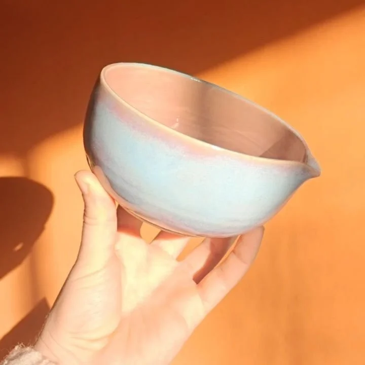 Sometimes &mdash; just sometimes &mdash; reglazing a &ldquo;failed&rdquo; piece turns out better than expected.
I never planned this soft pink and turquoise glaze (and I doubt I could recreate it), but here it is.
Ceramics is full of surprises.

#pot