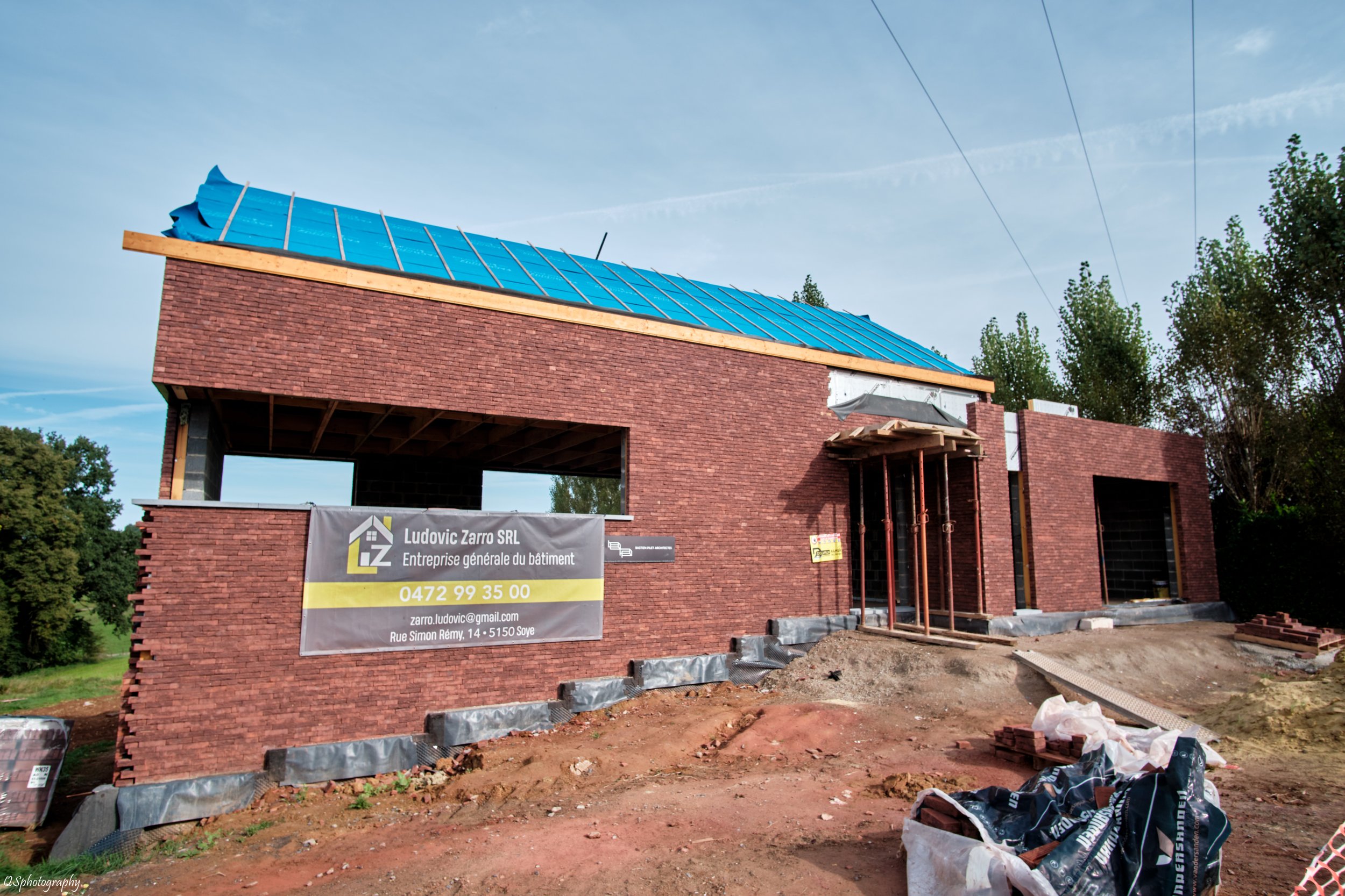 Construction d'une maison en briques rouges | QSphotography | Namur