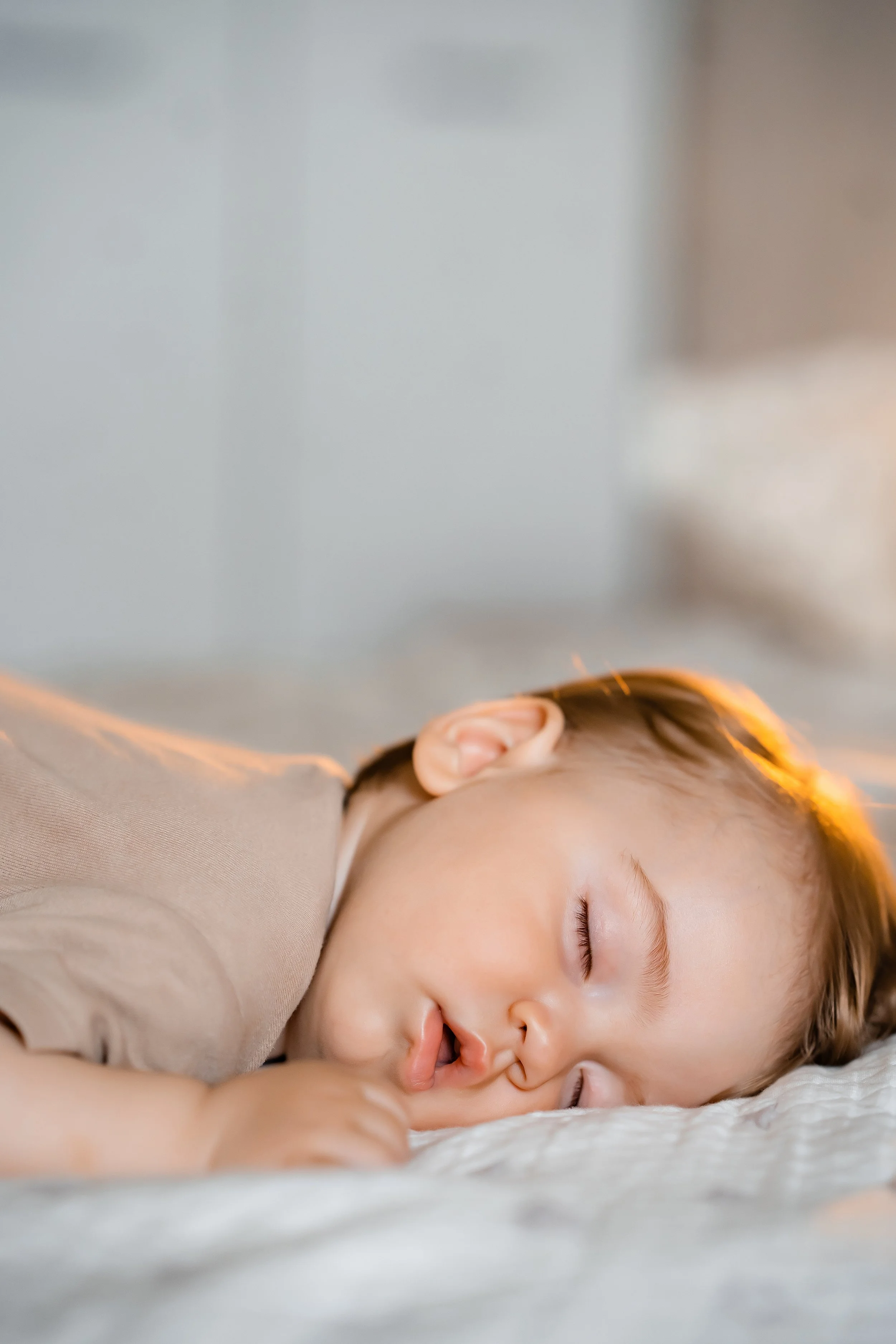 portrait-of-a-funny-baby-sleeping-on-his-stomach-o-2026-03-13-04-24-58-utc.jpg