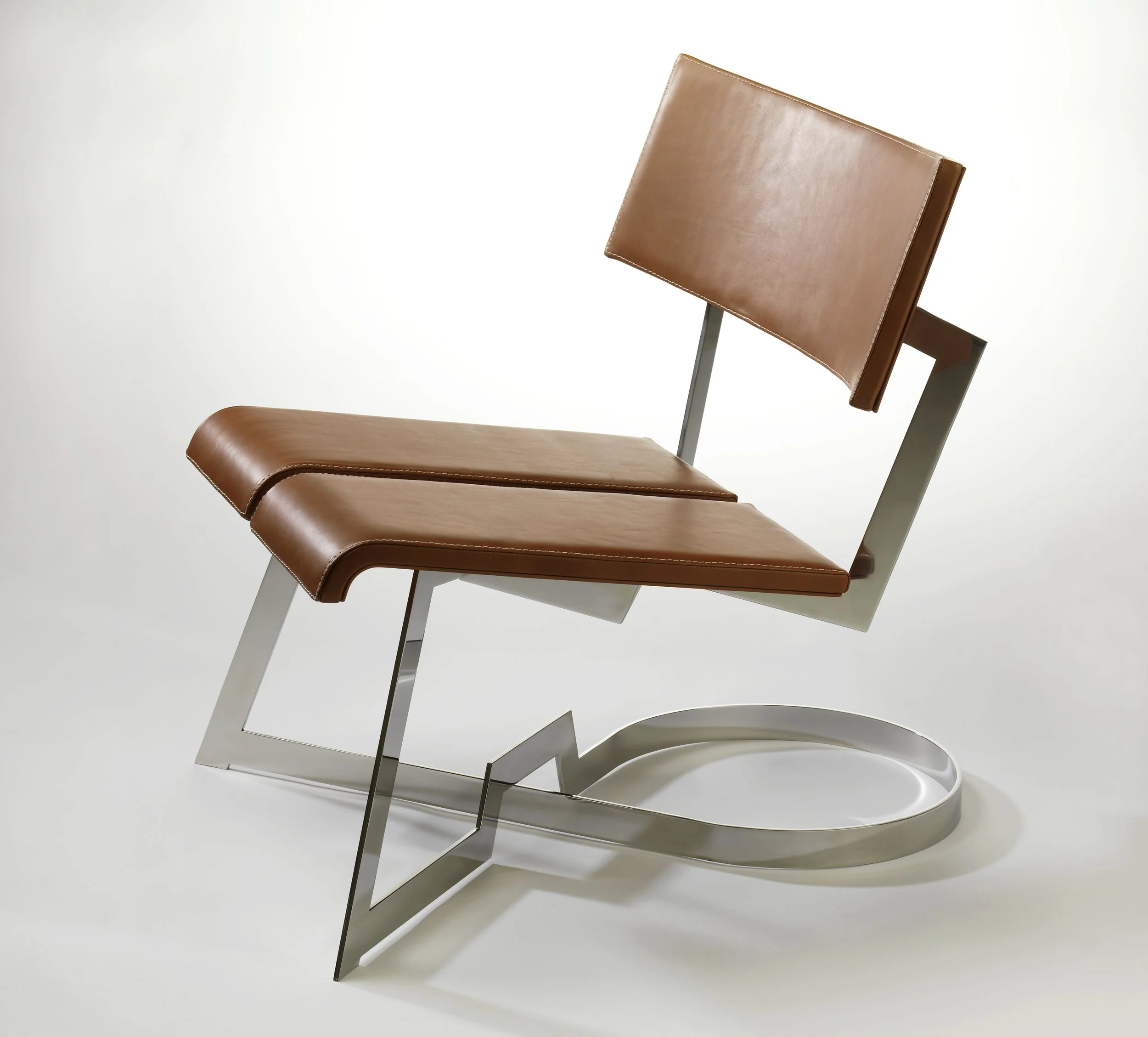 Modern chair with brown leather upholstery and a sleek metal frame set against a neutral background.