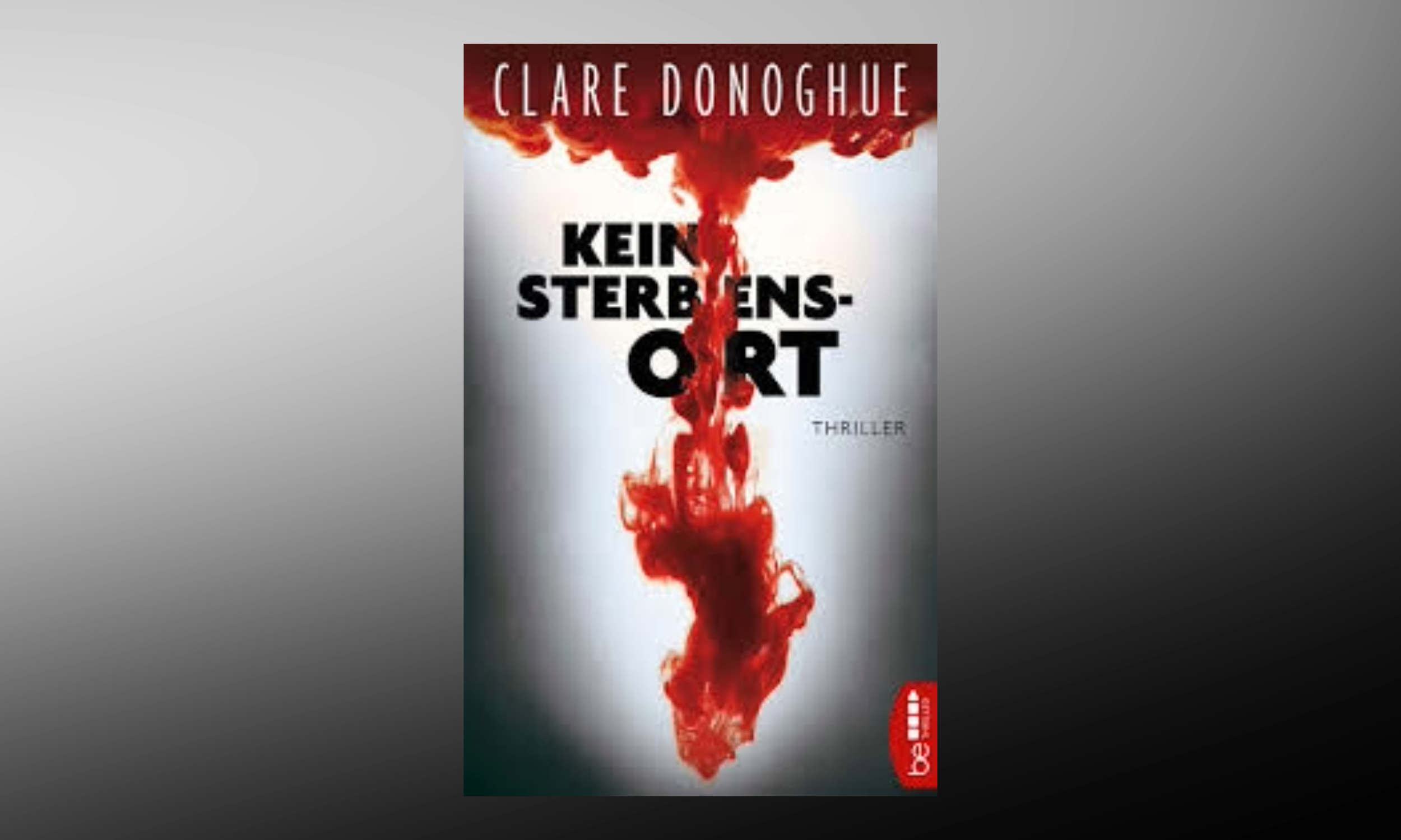 Book cover with black, white, and red colors, titled 'Kein Sterbensort' by Clare Donoghue, labeled as a thriller, featuring an abstract red inkblot or smoke design in the center.