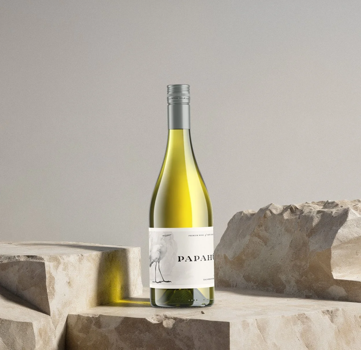 Papahu white wine bottle on a stone surface.