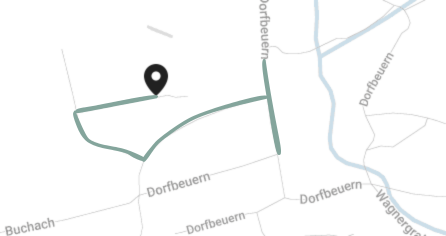 Karte mit einer Route und einem Markierungspunkt in einem Dorf in Deutschland.