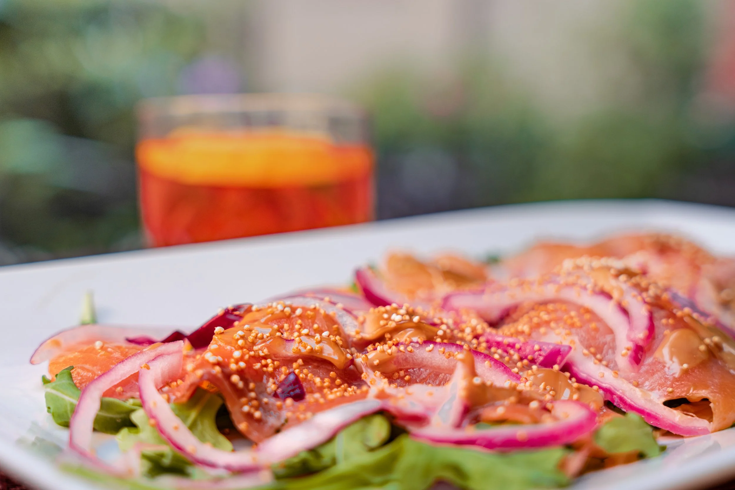 Carpaccio di salmone e spritz Amaranto cocktail bar Parioli 