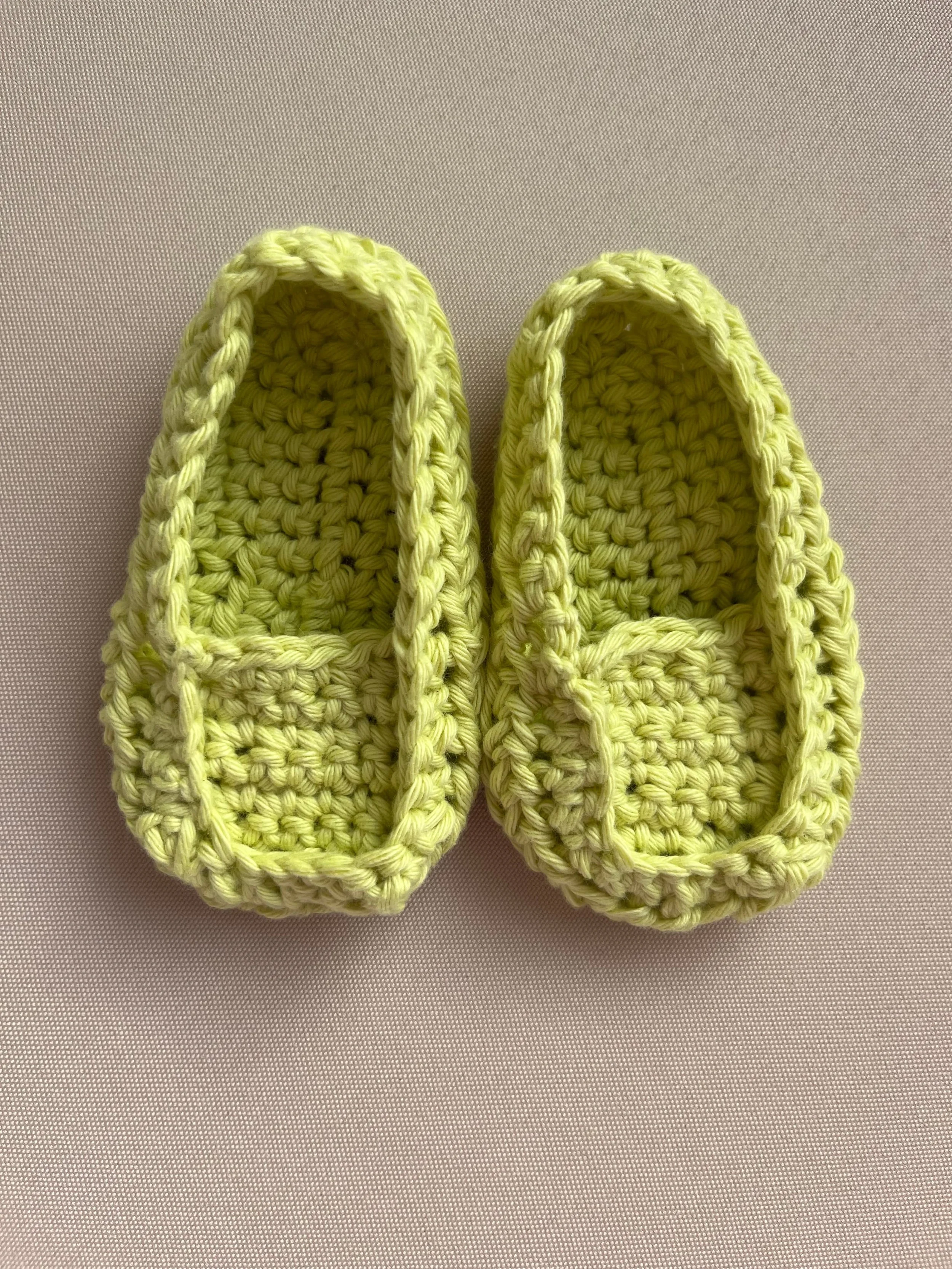 Handmade baby booties in green soft cotton yarn by Tidestitch.jpg