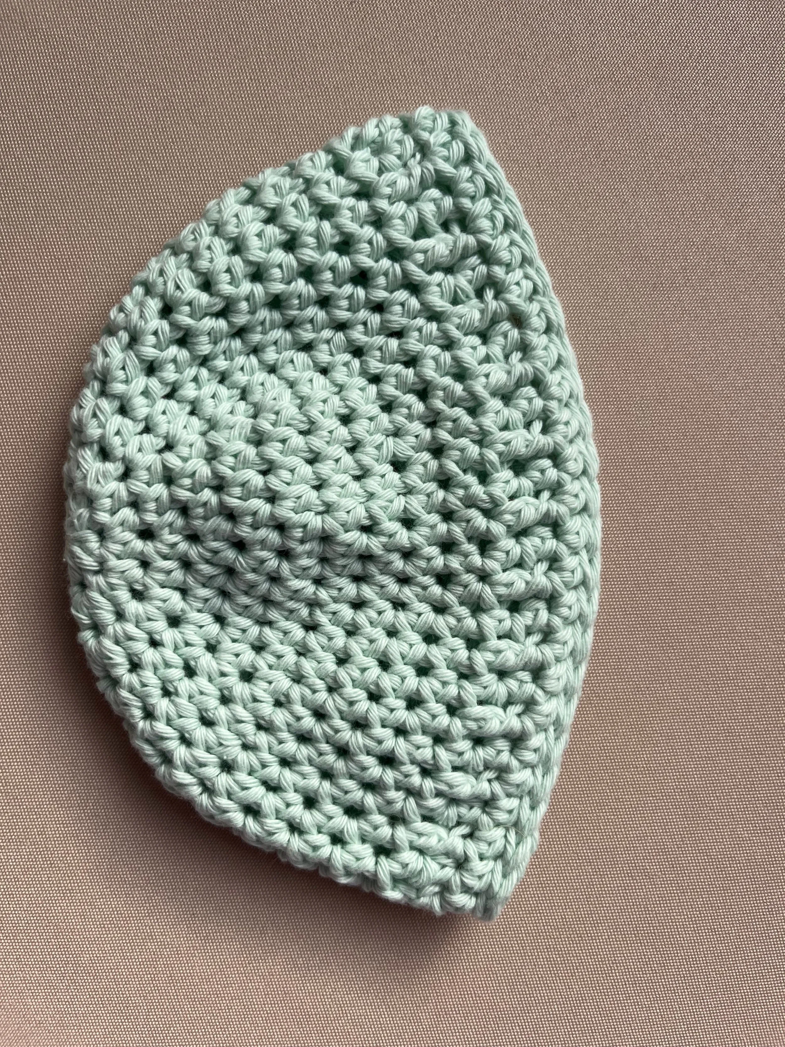 Handmade baby beanie in blue soft cotton yarn by Tidestitch angle 2..jpg