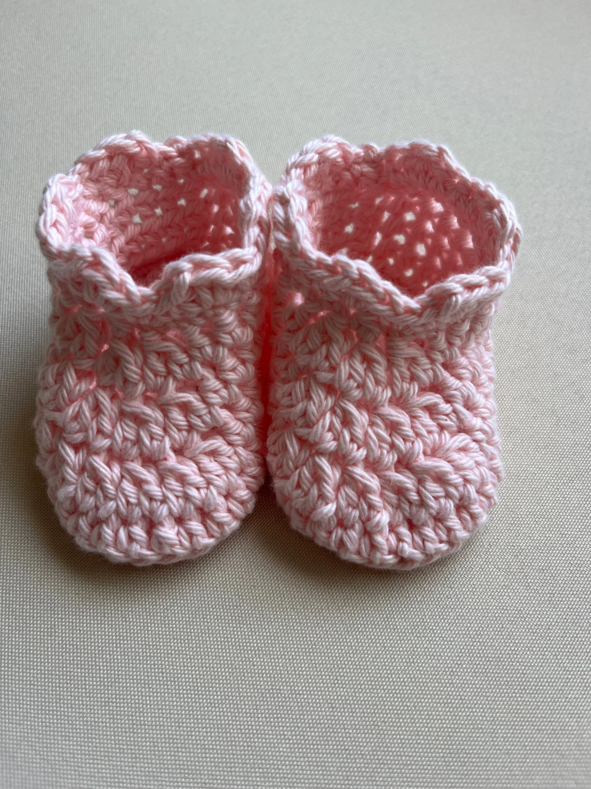 Handmade baby booties in blush soft cotton yarn by Tidestitch.jpg