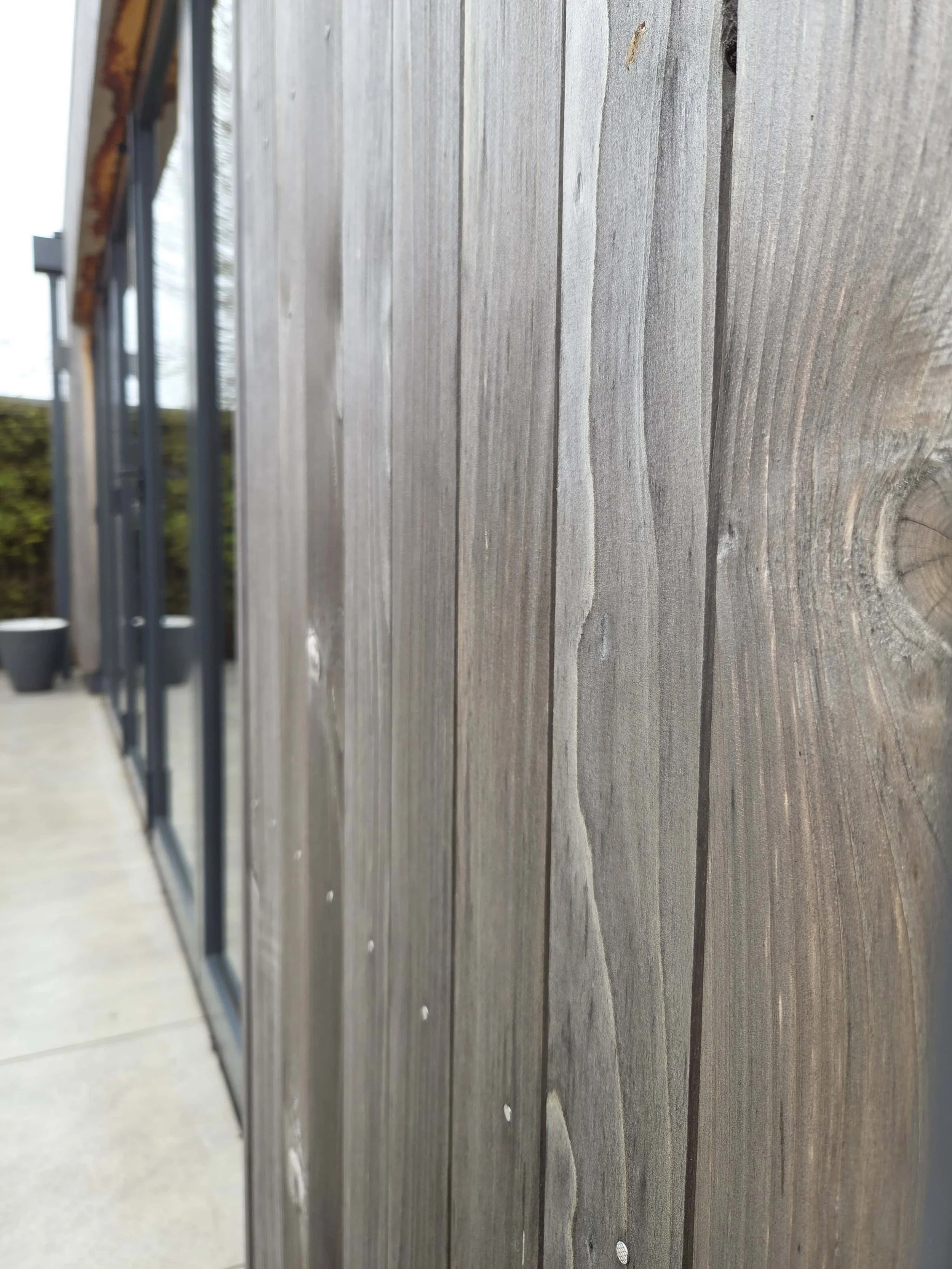 Close up detail of contemporary modern timber cladding to home extension.