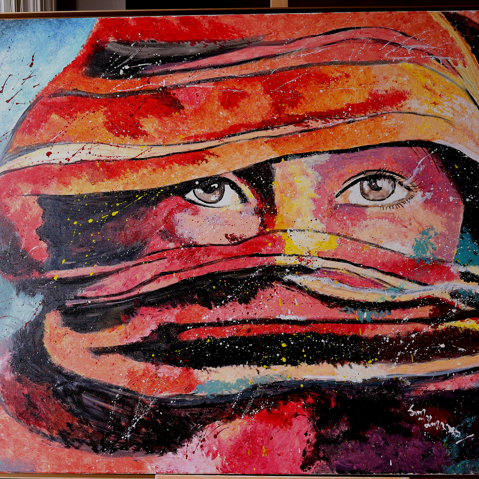 Abstract watercolor painting of a person's face with eyes visible, partially obscured by colorful, flowing shapes and paint splatters.