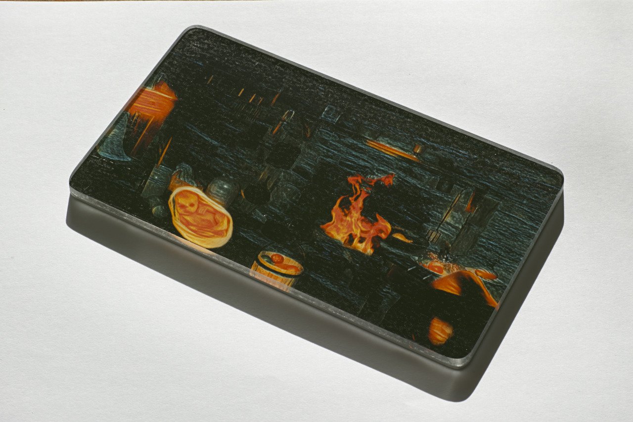 A rectangular box with fantasy-style artwork of a forge scene, including a flaming furnace, anvil, and tools, with a dark and fiery atmosphere.