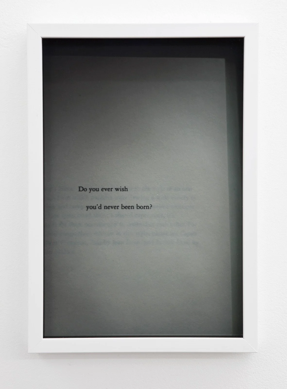 A framed sheet of paper with a poetic question: "Do you ever wish you'd never been born?"