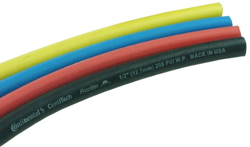 Four colorful hoses arranged diagonally, in yellow, blue, red, and black colors, with black hose showing brand and specifications.