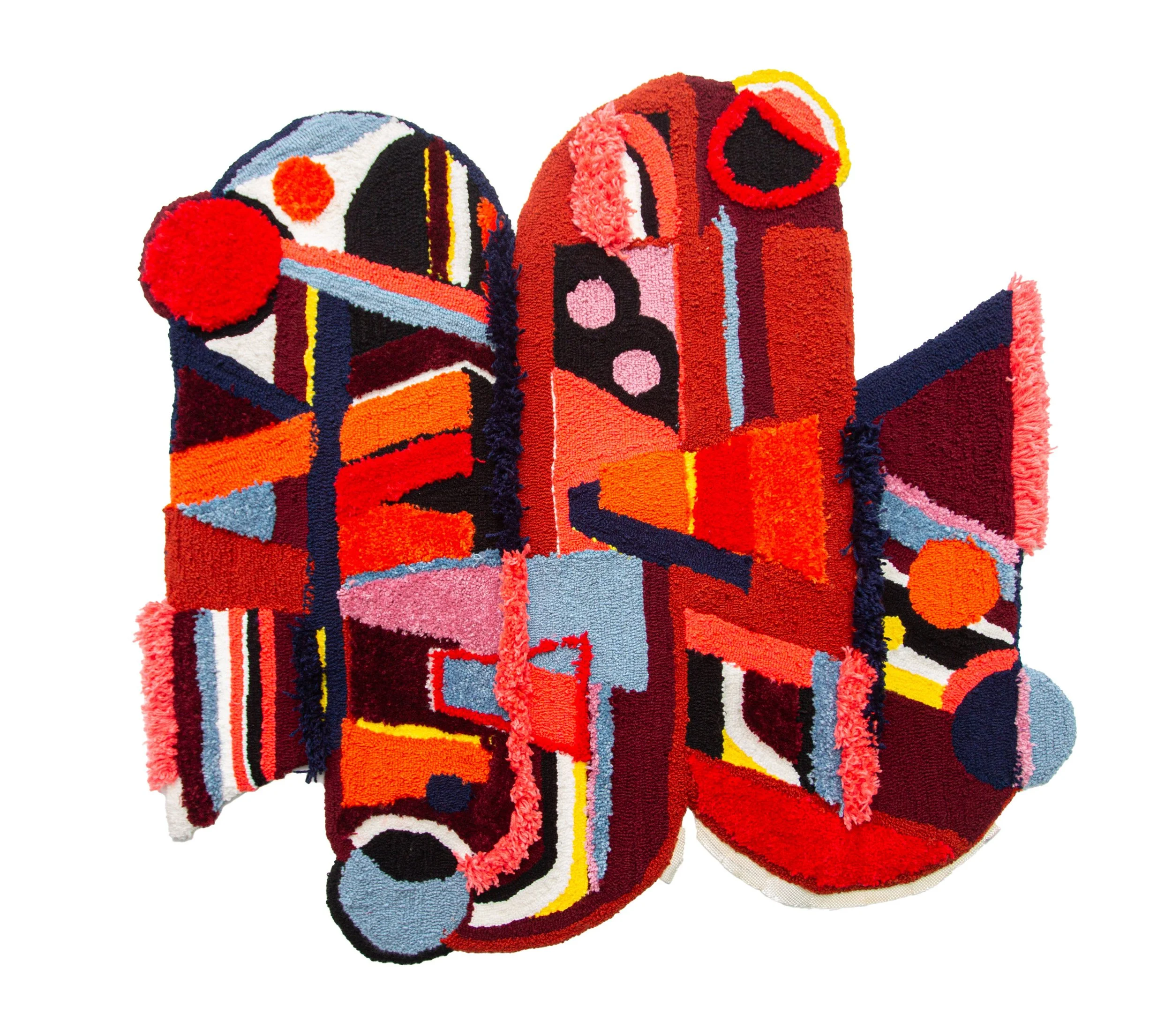 Colorful abstract rug with geometric shapes and bold colors like red, black, yellow, orange, and pink.