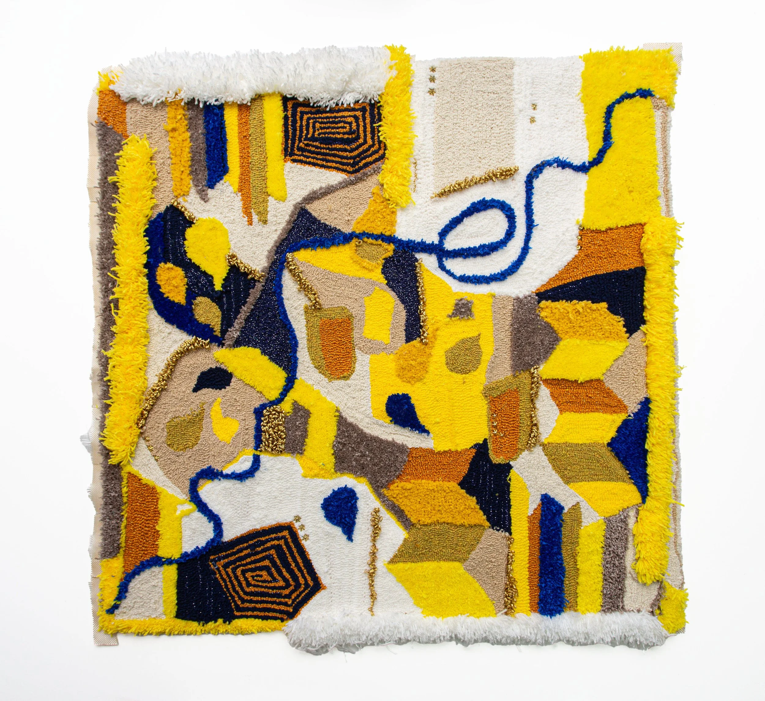 Abstract colorful textile artwork with yellow, blue, orange, black, beige, and white geometric shapes and lines.