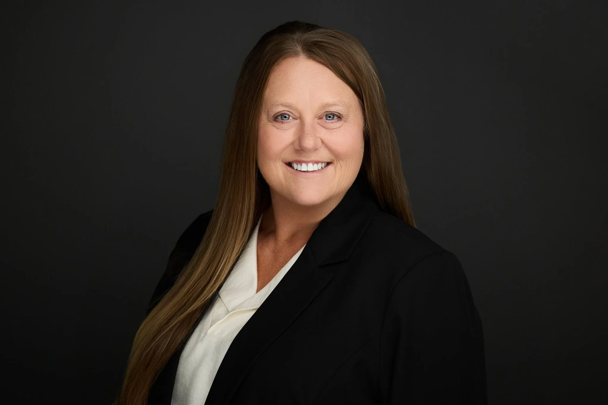 Headshot of licensed agent, Stephanie Waszgis.