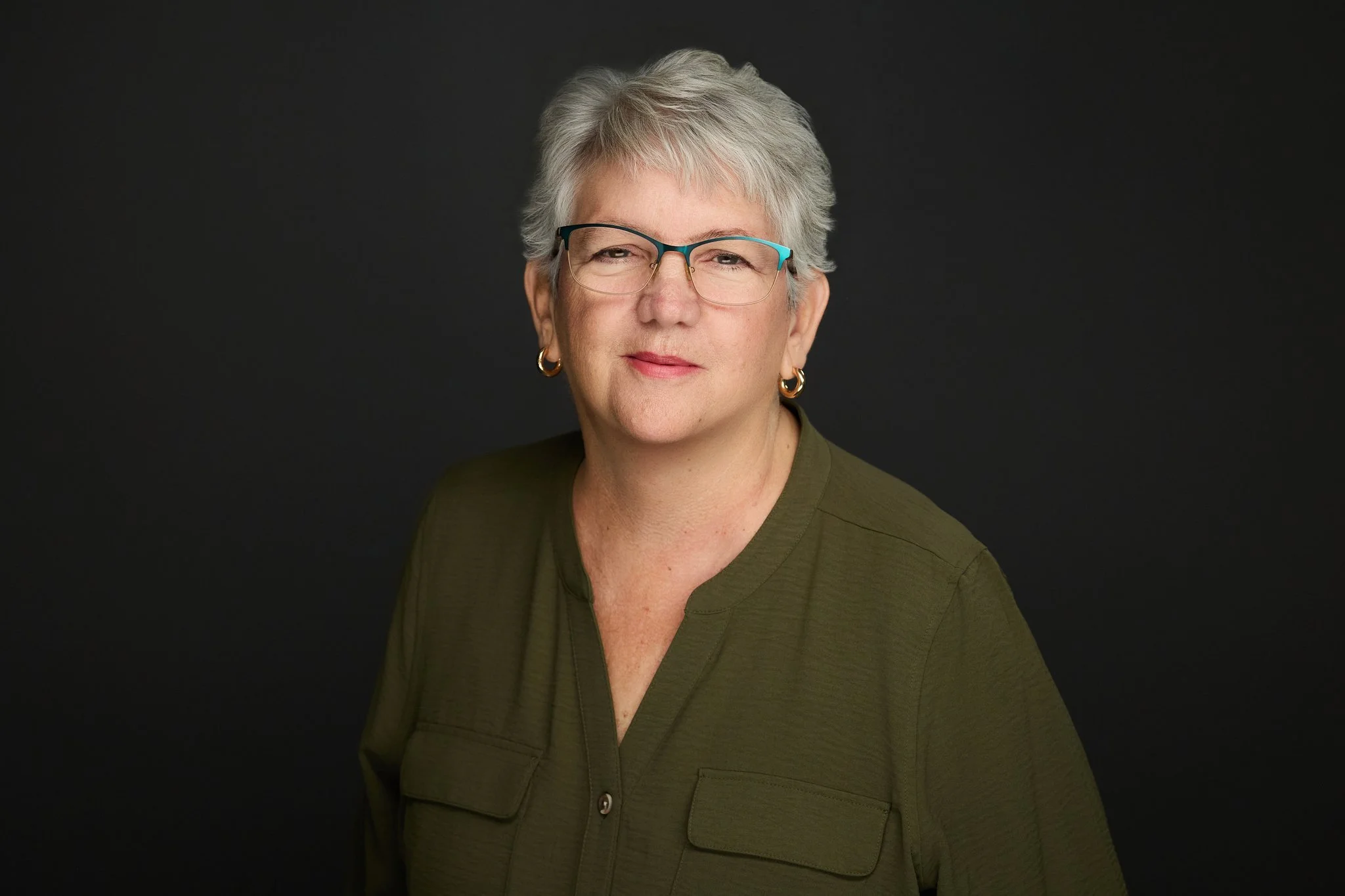 Headshot of the agency's commissions manager. 