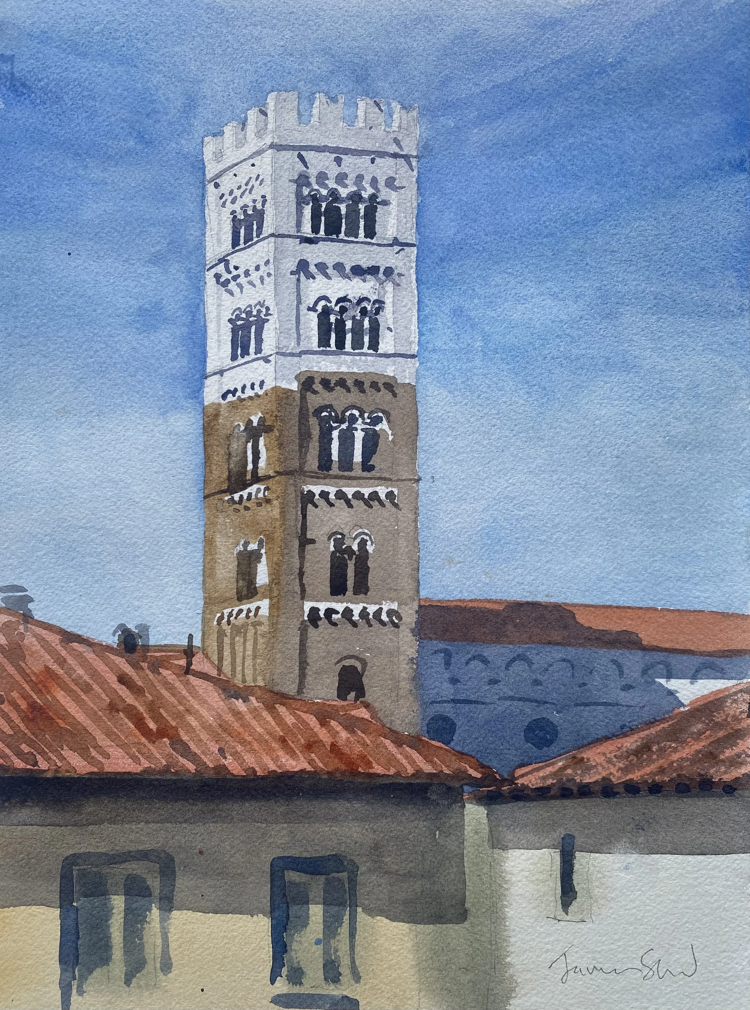 A luminous tower of white and brown stone appears serenely over terracotta tile roofs under a deep blue sky