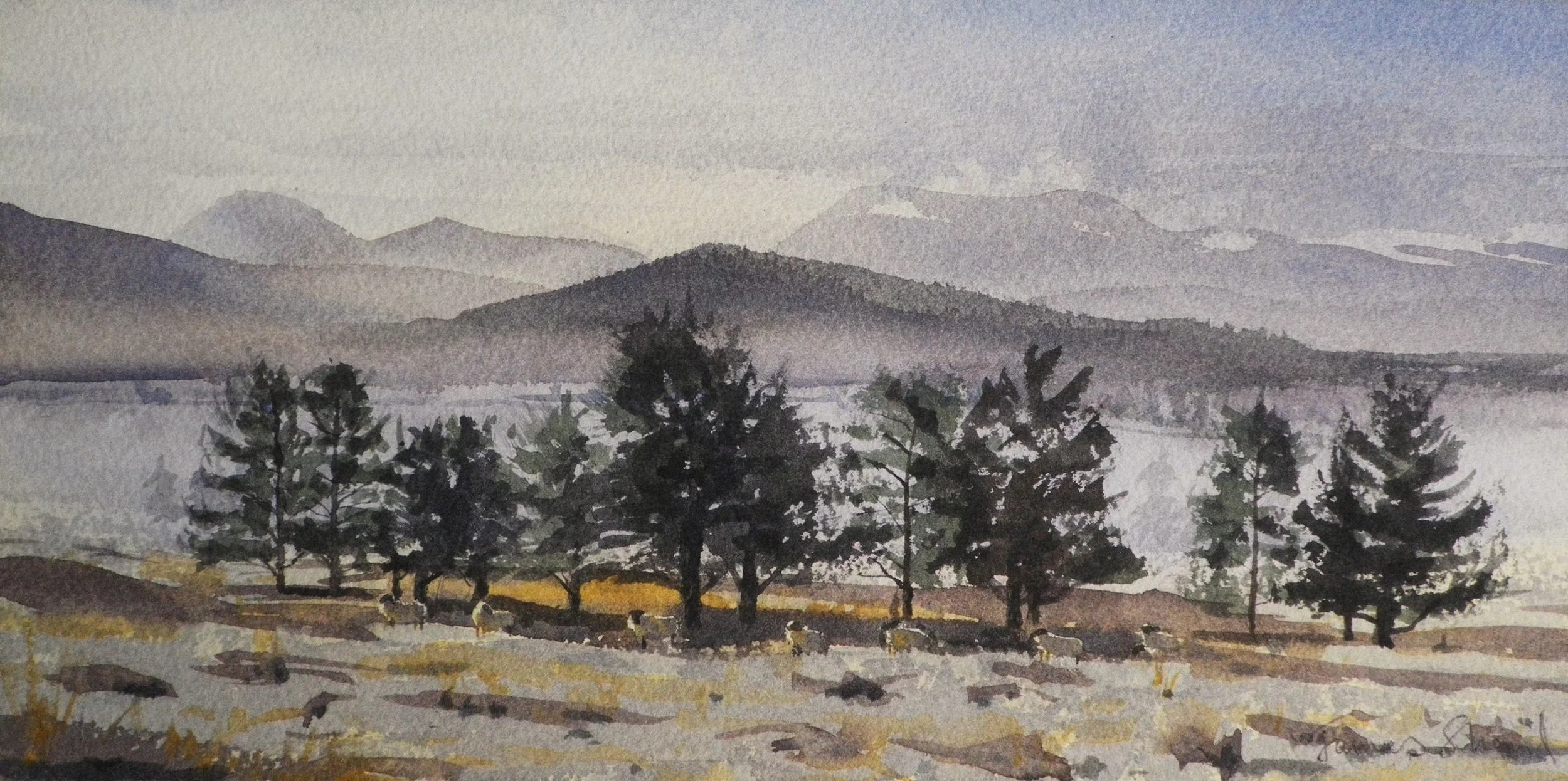 Watercolor painting of a landscape featuring a row of trees in the foreground, a distant lake, rolling hills, and mountains in the background under a cloudy sky.