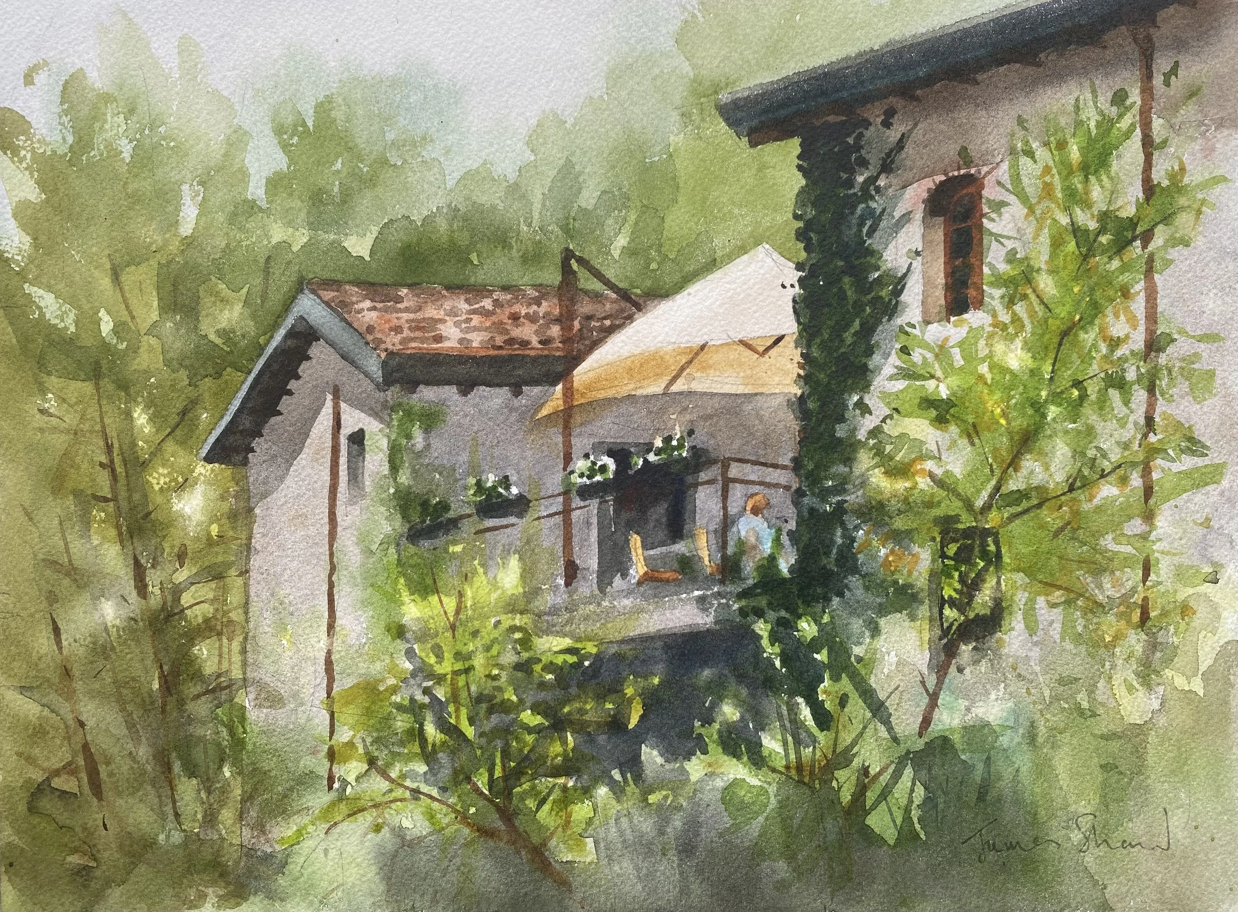 A substantial stone building rises out of gardens and wild woodland, while the eye is drawn to the figure sitting under a broad parasol on a flower filled terrace