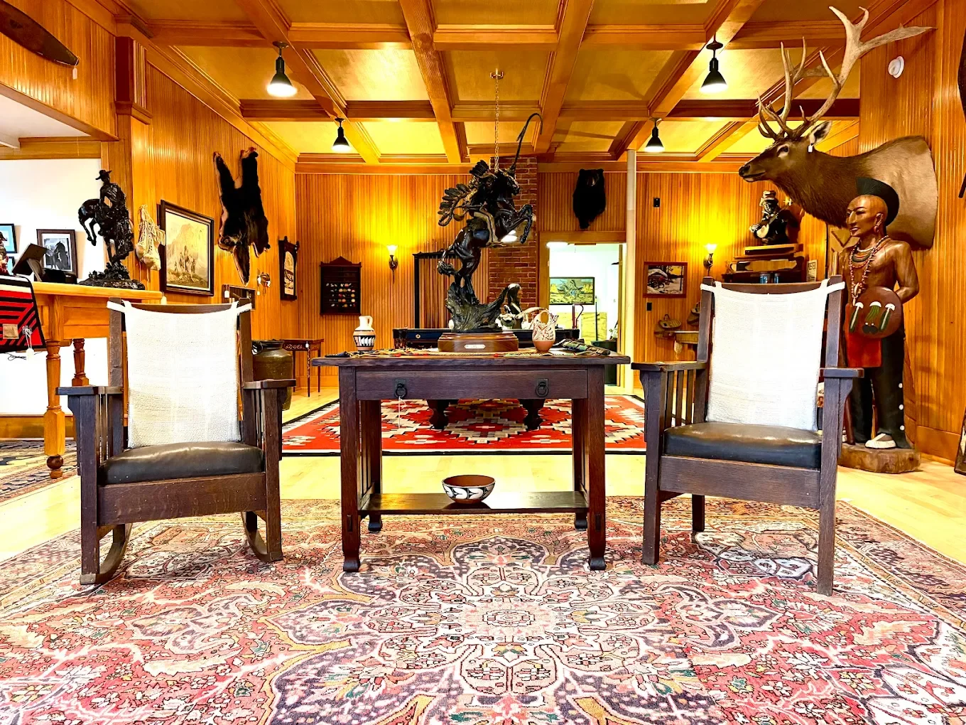 Library desk flanked by two chairs