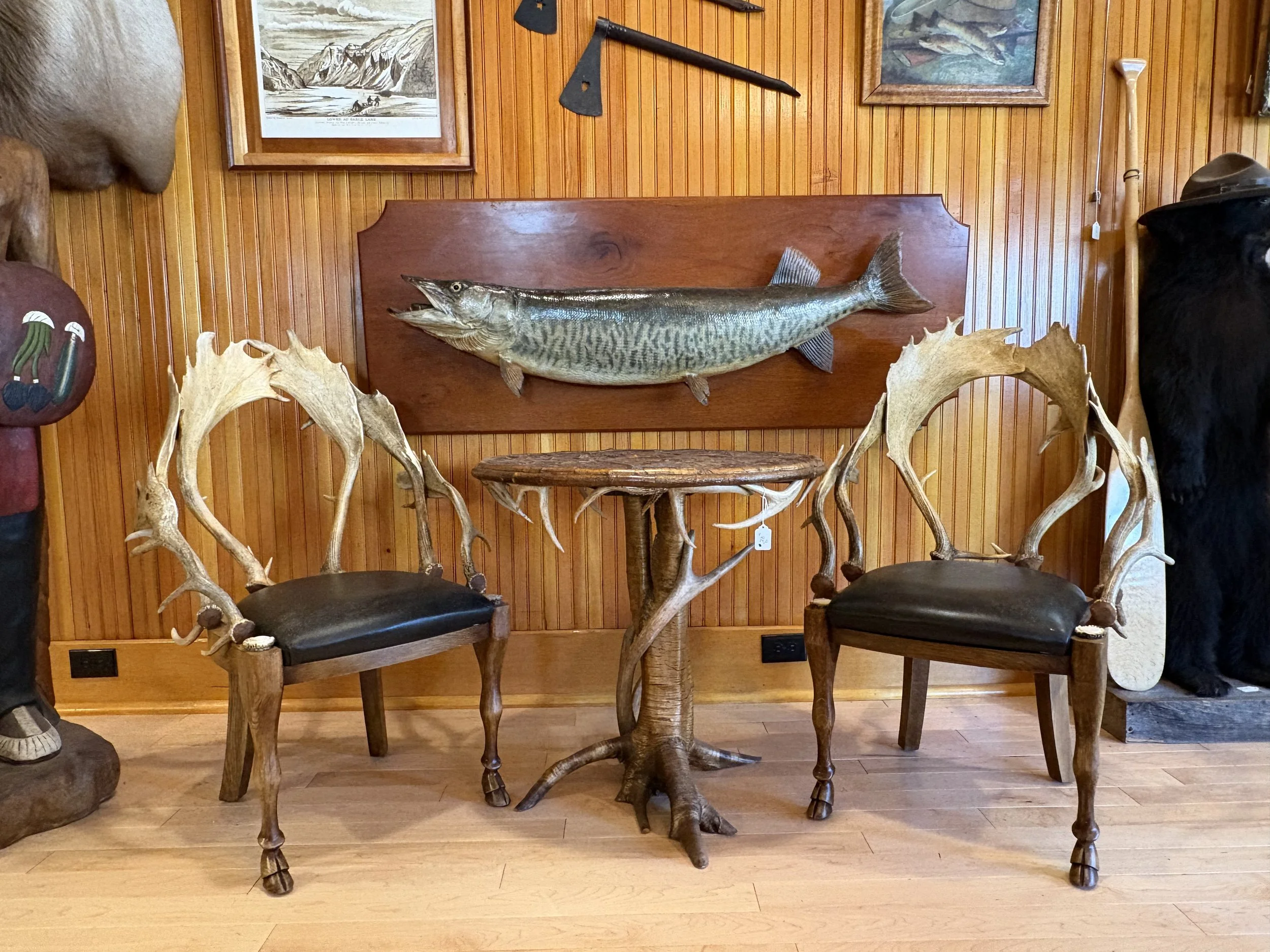 Two chairs made of antlers
