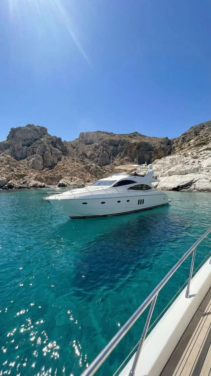 Luxury gulet, motor yacht and catamaran cruising side by side in Bodrum’s crystal-clear Aegean waters, comparing the best yacht charter options for every travel style.