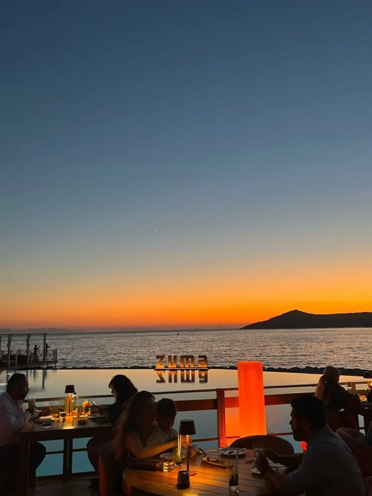 Yalıkavak Marina in Bodrum featuring luxury superyachts, designer boutiques, fine dining restaurants and a vibrant waterfront promenade overlooking the Aegean Sea.