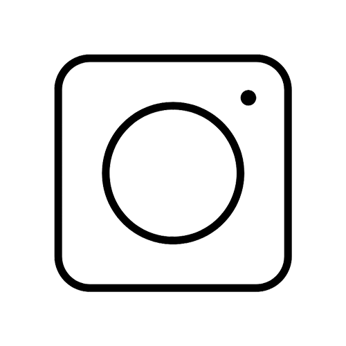 Outline of a washing machine with a round door and a small control button in the upper right corner.