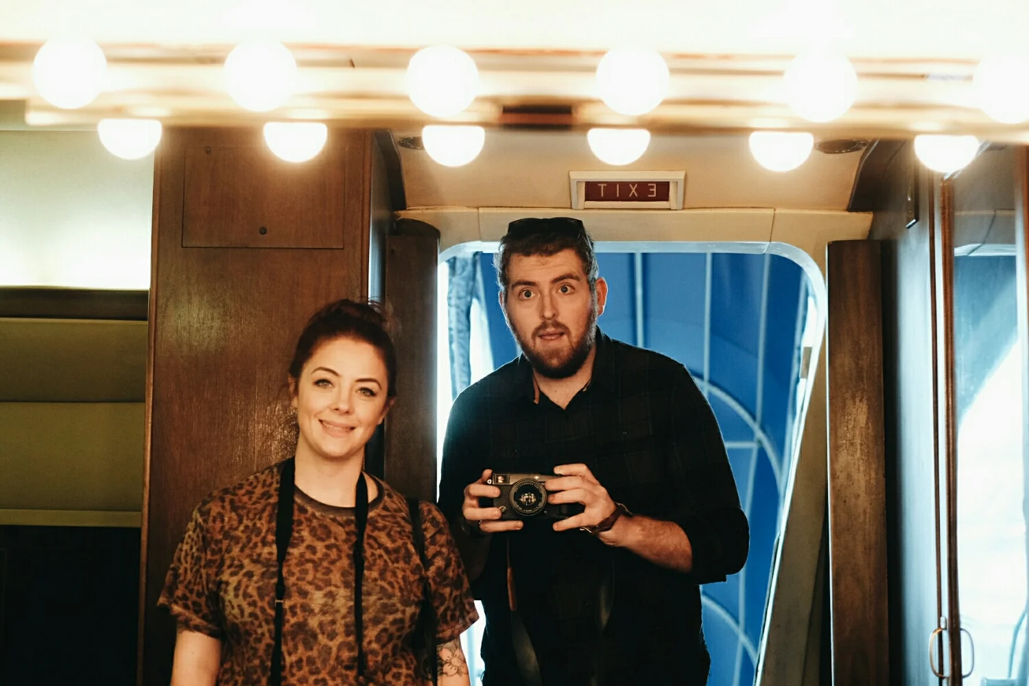 mirror selfie in the bathroom of Elvis' private plane. obviously.