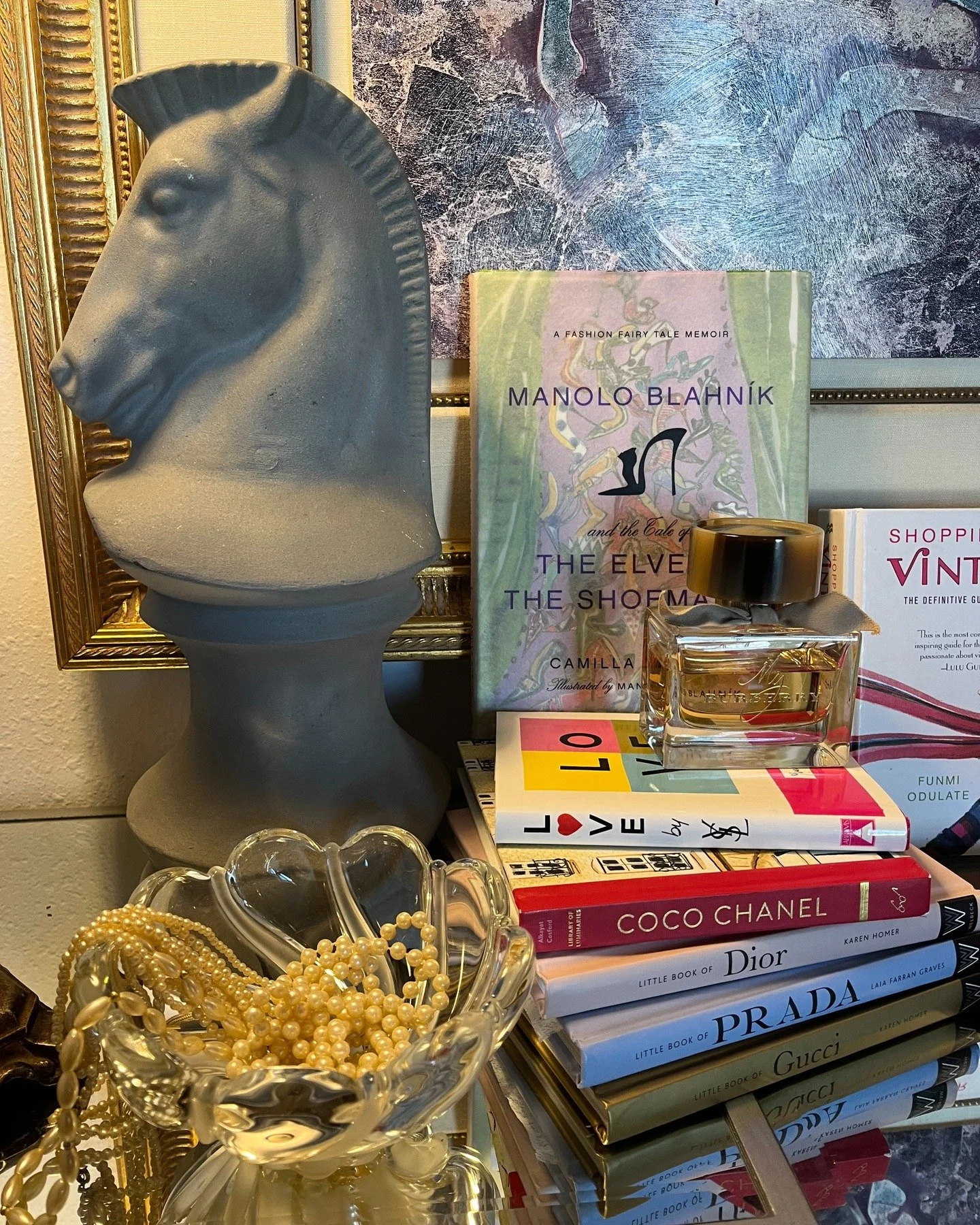 A little corner of Glam Vintage where fashion history lives on the shelf.
From iconic style moments to leopard-print drama, this vignette is a love letter to the women, eras, and details that continue to inspire how we dress and decorate today. Books