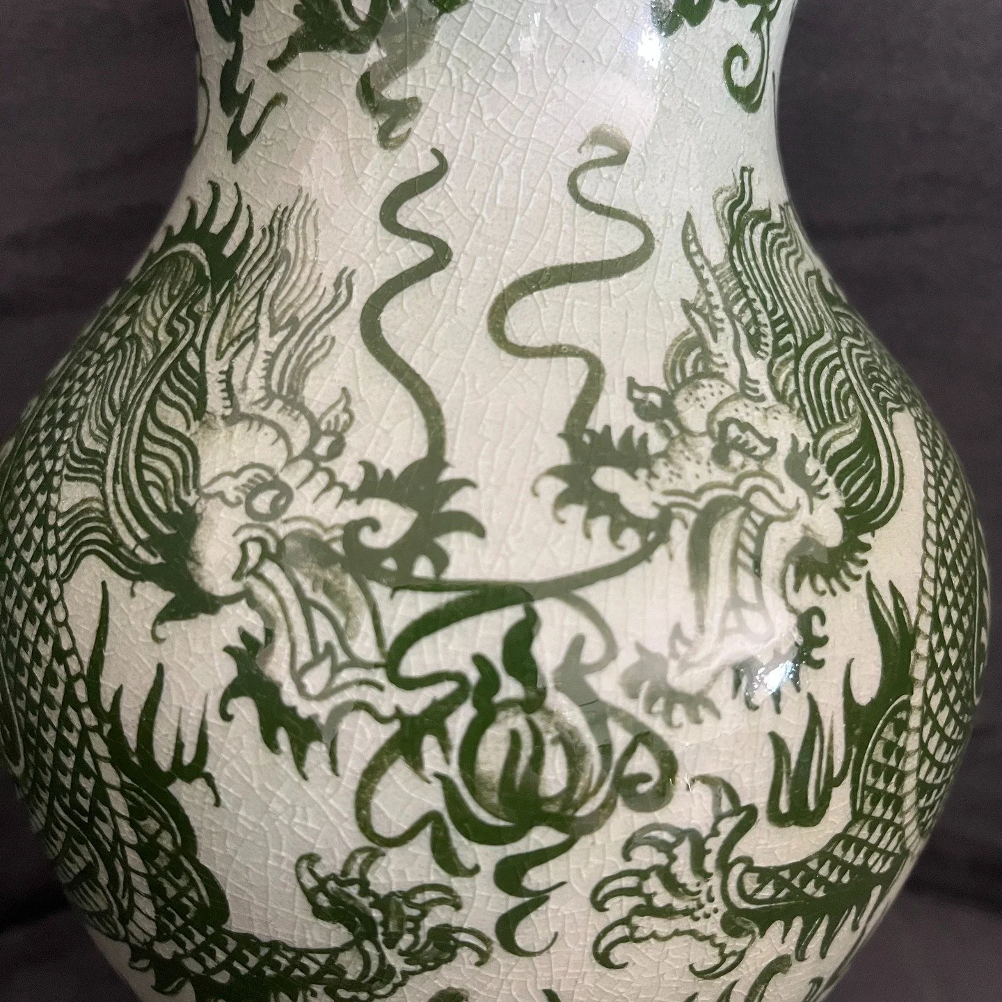 Vintage Thai celadon vase from Chiang Mai with hand-painted dragon motif and crackle glaze. Dragon imagery symbolizes Strength Protection Good fortune
#VintageVase

#CeramicVase

#DragonVase

#VintageCeramics

#DecorativeVase

#ChinoiserieStyle

#Asi