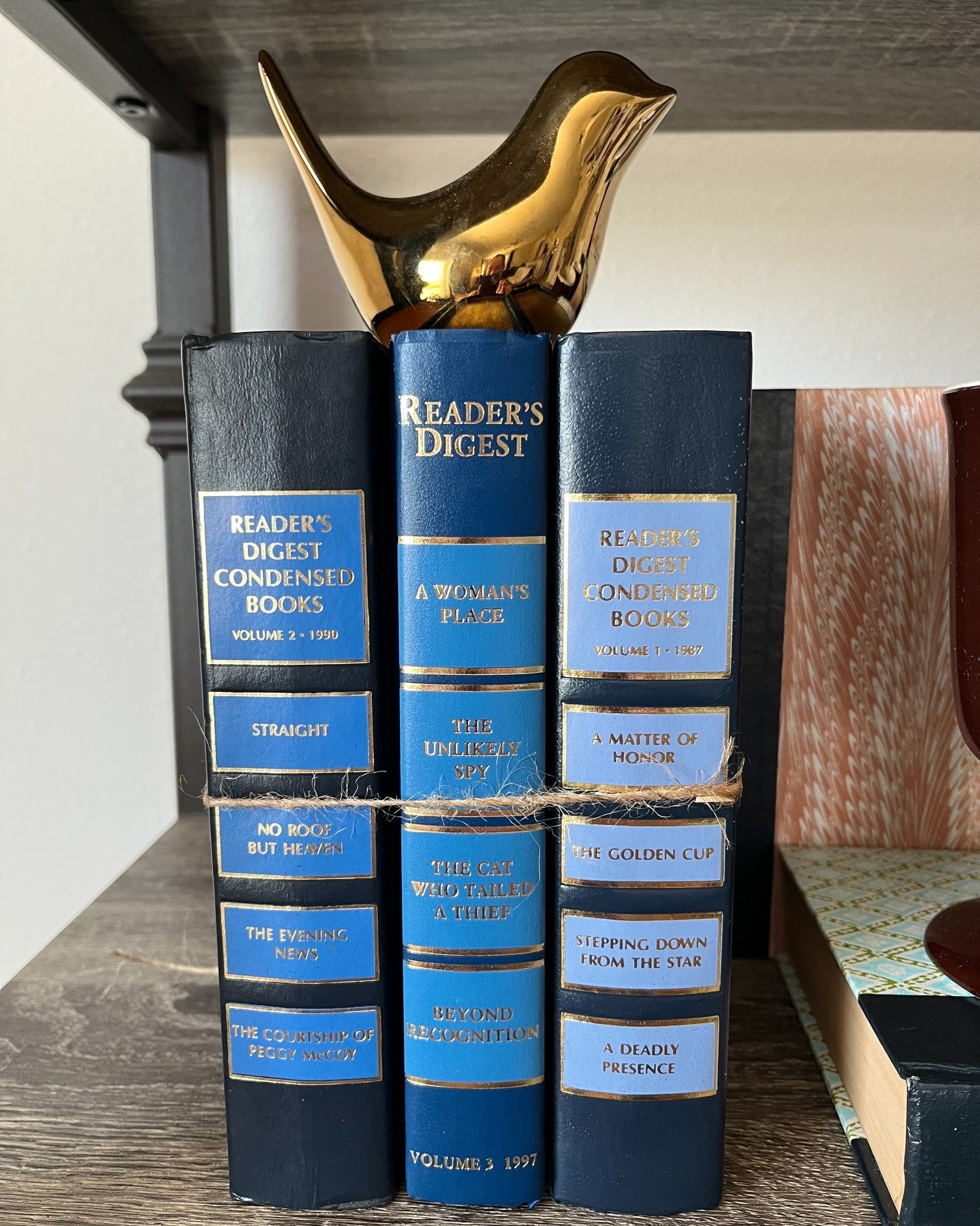 A little blue, a little gilt, and a lot of character.

Vintage Reader&rsquo;s Digest books like these are wonderful for adding richness and structure to a shelf, console, or bookcase. Paired with a gilded accent, they bring warmth, history, and that 