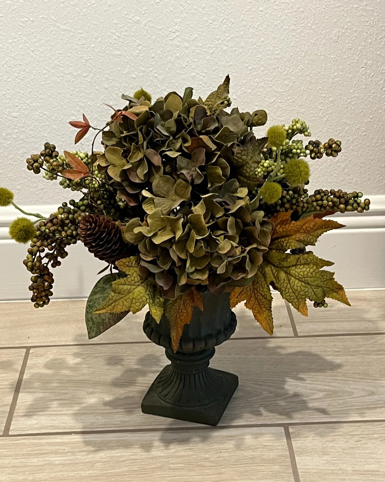 Soft cream florals with a romantic garden feel.

These oversized blooms bring instant softness to a table, shelf, bedroom corner, or vanity. The palette is neutral enough to work year round, but still pretty enough to feel special.

A simple way to a