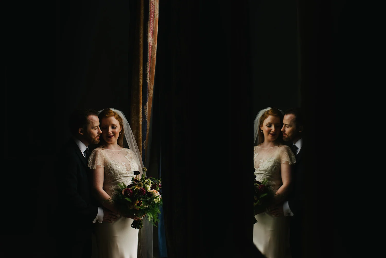 A couple photographed at their wedding in Malone House, Belfast