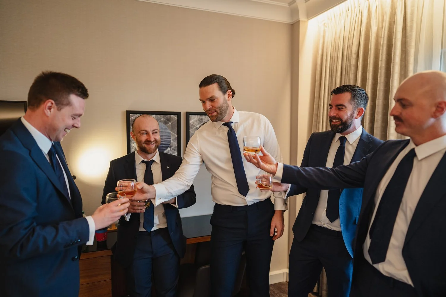  Laura and Matthews wedding in the Muddler’s Club restaurant in Belfast’s Cathedral Quarter. The couple got ready in the Hilton hotel before heading to St.Malachy’s church for their ceremony. Afterwards, we took photos around Cathedral Quarter before