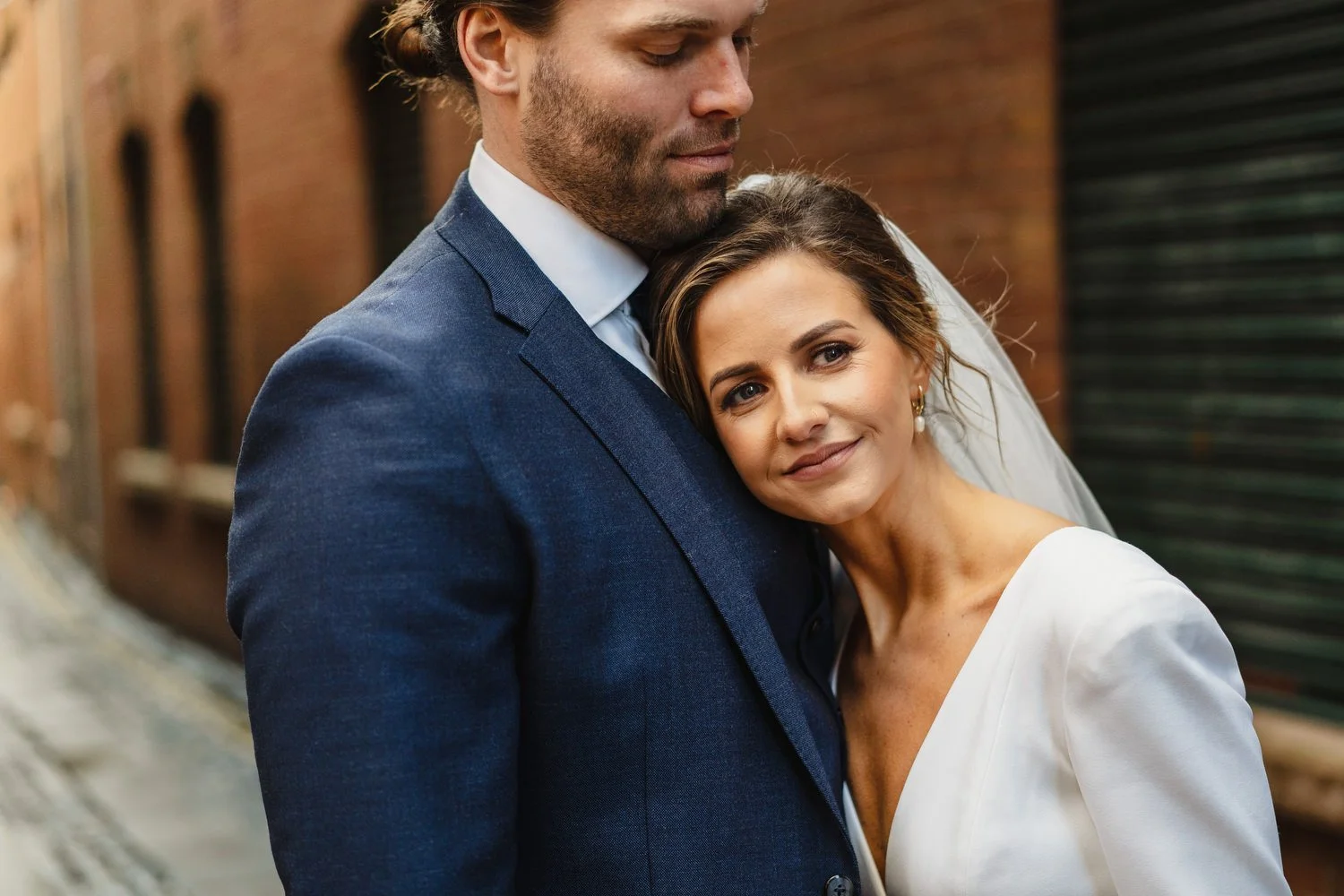  Laura and Matthews wedding in the Muddler’s Club restaurant in Belfast’s Cathedral Quarter. The couple got ready in the Hilton hotel before heading to St.Malachy’s church for their ceremony. Afterwards, we took photos around Cathedral Quarter before