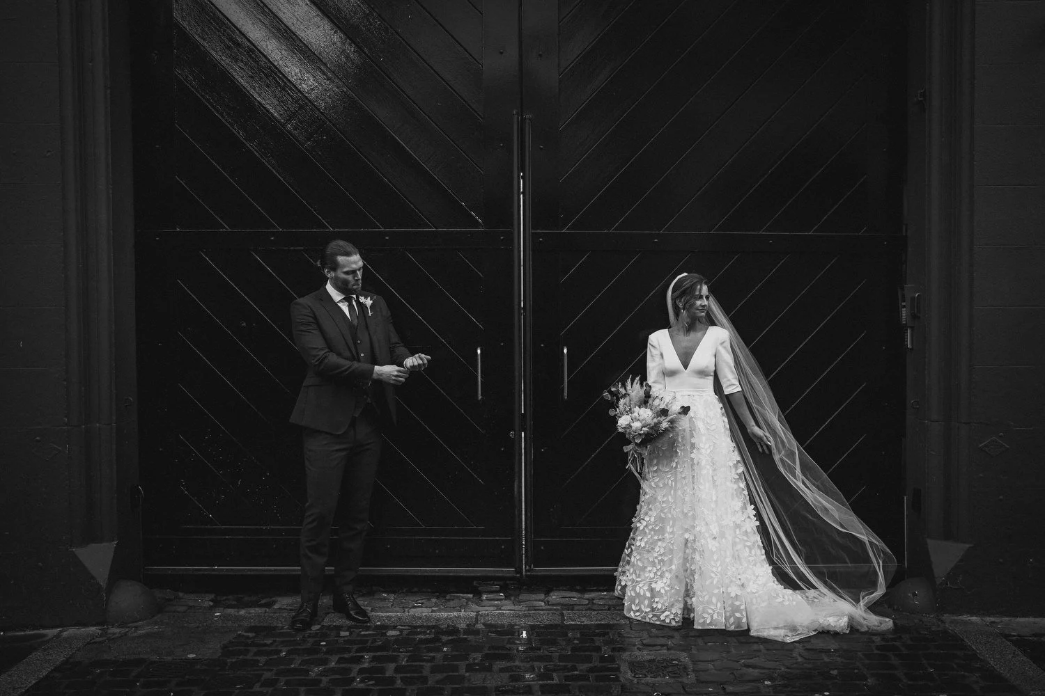  Laura and Matthews wedding in the Muddler’s Club restaurant in Belfast’s Cathedral Quarter. The couple got ready in the Hilton hotel before heading to St.Malachy’s church for their ceremony. Afterwards, we took photos around Cathedral Quarter before