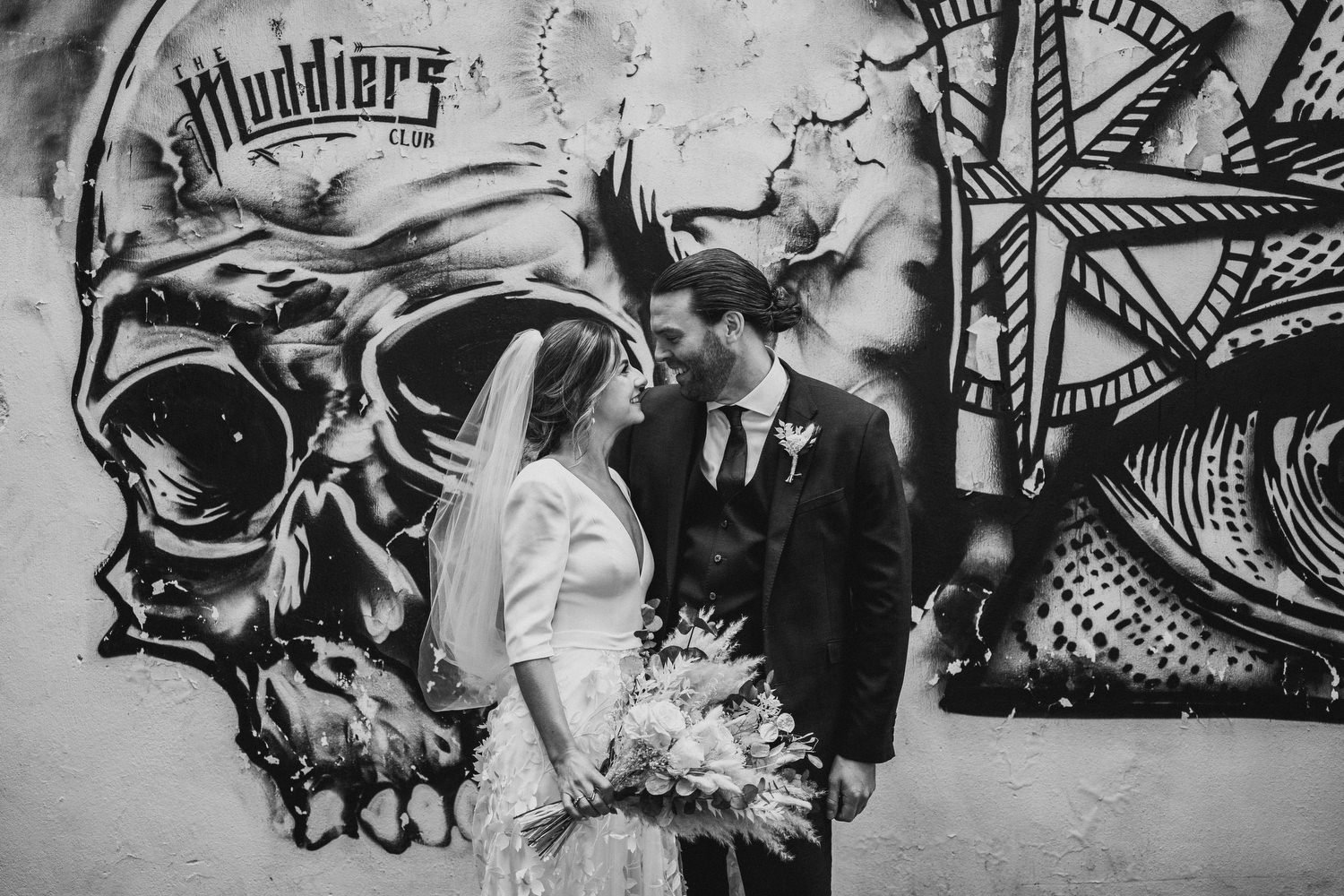  Laura and Matthews wedding in the Muddler’s Club restaurant in Belfast’s Cathedral Quarter. The couple got ready in the Hilton hotel before heading to St.Malachy’s church for their ceremony. Afterwards, we took photos around Cathedral Quarter before