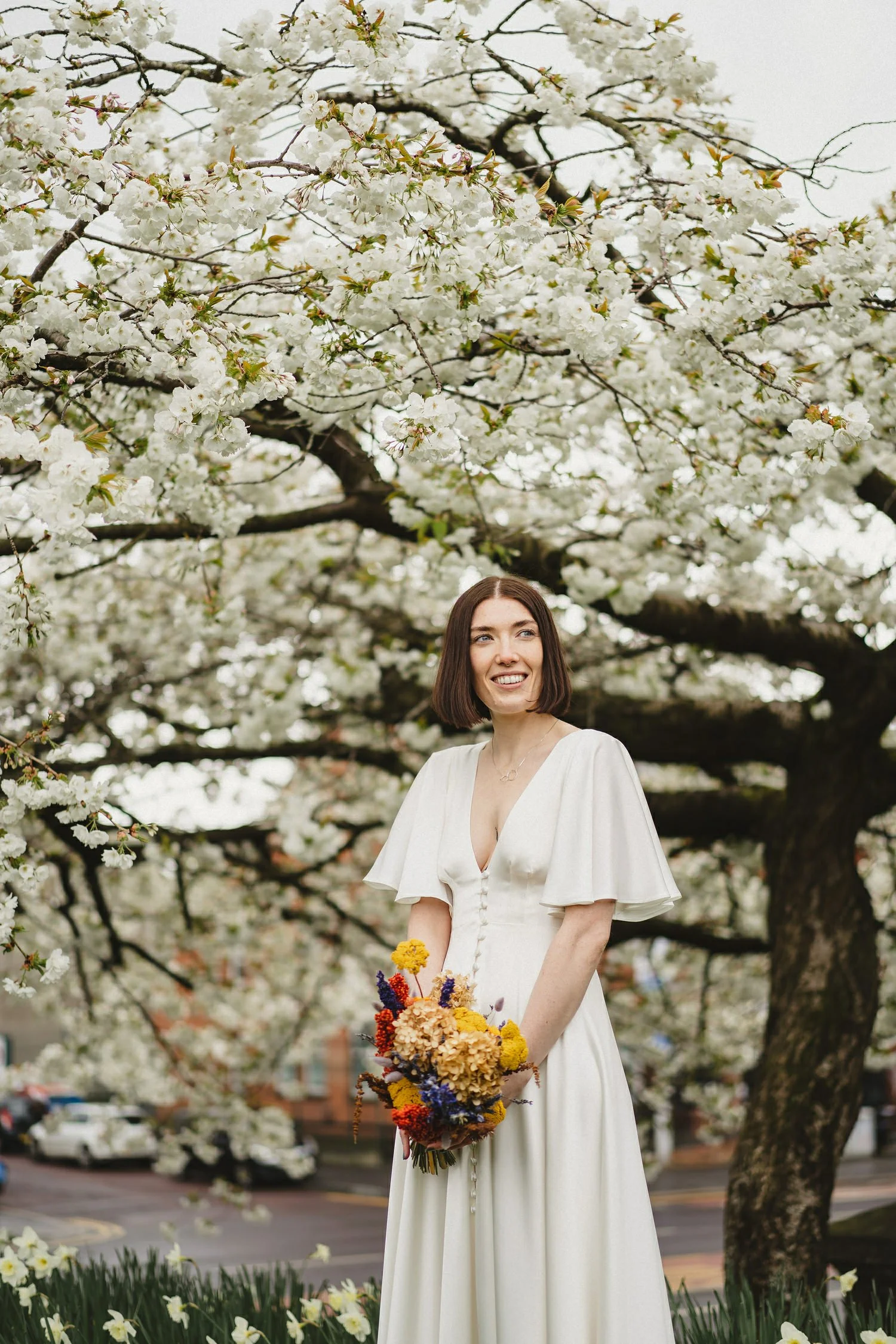  Kathryn and ChrisÕs wedding was supposed to be in Babel rooftop but it burned down 4 days before they were due to get married.  Instead they had their humanist wedding in their own house followed by photos in nearby Ormeau Park and Belfast Cathedral