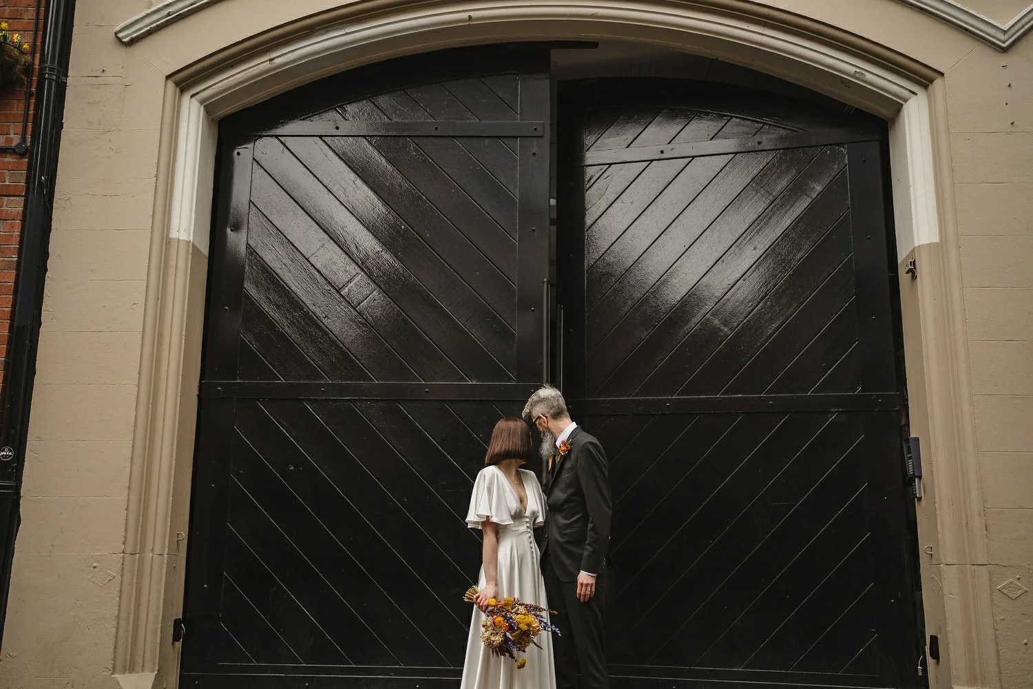  Kathryn and ChrisÕs wedding was supposed to be in Babel rooftop but it burned down 4 days before they were due to get married.  Instead they had their humanist wedding in their own house followed by photos in nearby Ormeau Park and Belfast Cathedral