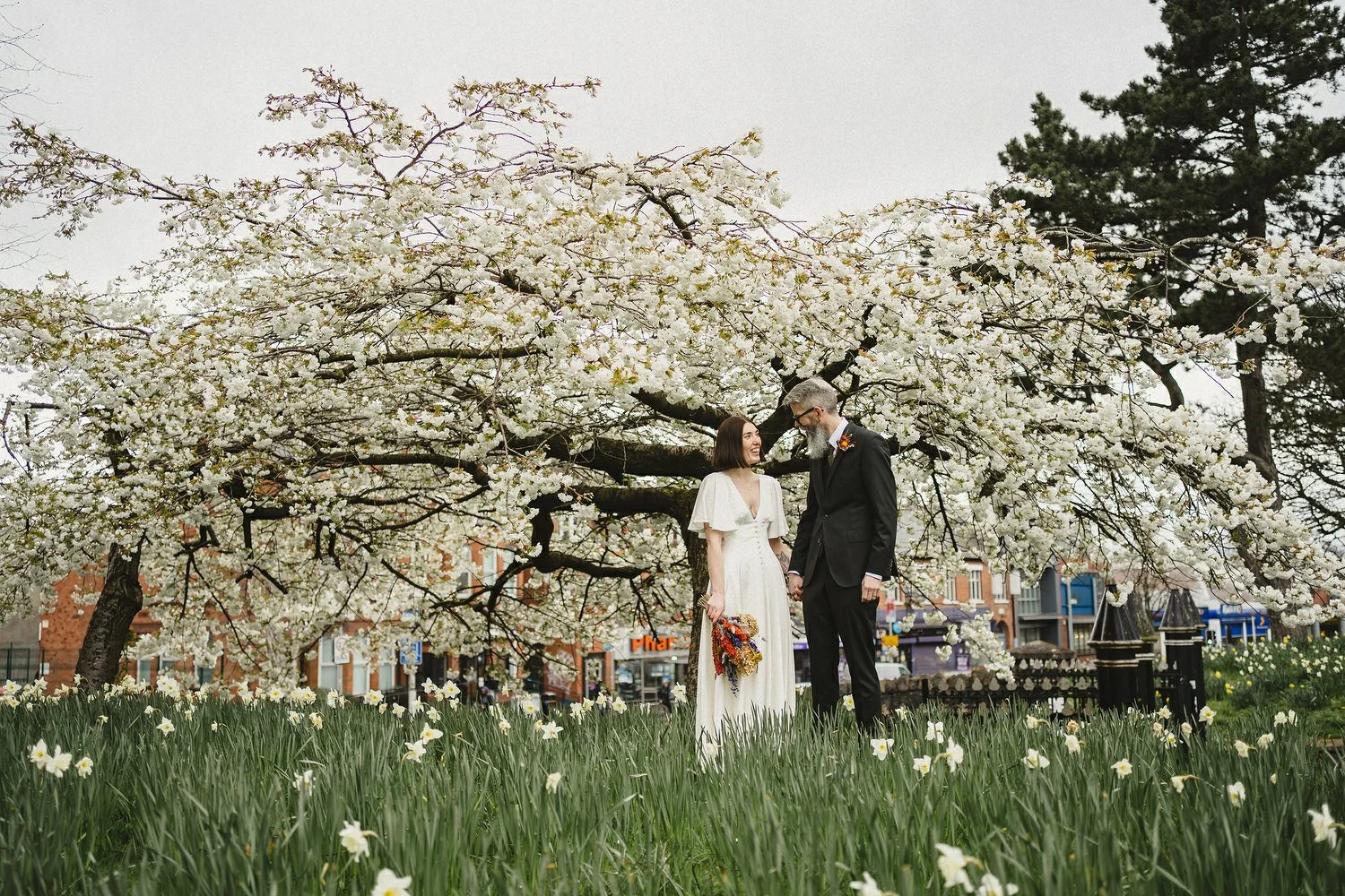  Kathryn and ChrisÕs wedding was supposed to be in Babel rooftop but it burned down 4 days before they were due to get married.  Instead they had their humanist wedding in their own house followed by photos in nearby Ormeau Park and Belfast Cathedral
