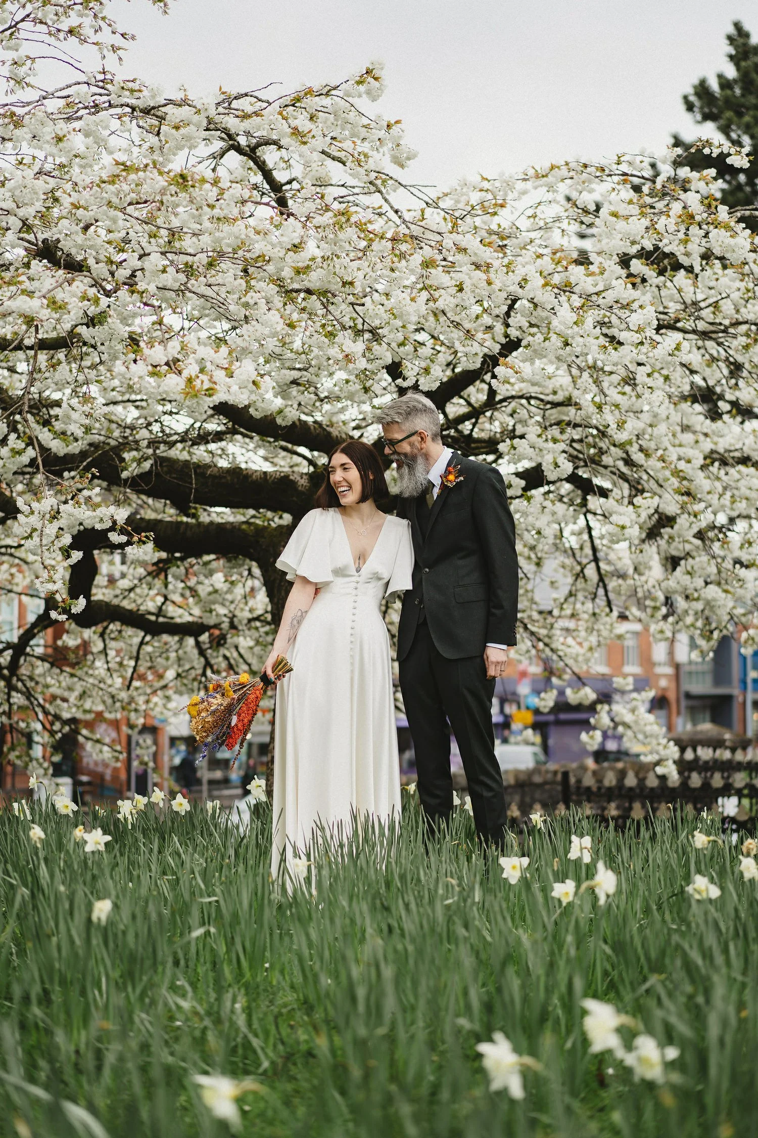  Kathryn and ChrisÕs wedding was supposed to be in Babel rooftop but it burned down 4 days before they were due to get married.  Instead they had their humanist wedding in their own house followed by photos in nearby Ormeau Park and Belfast Cathedral