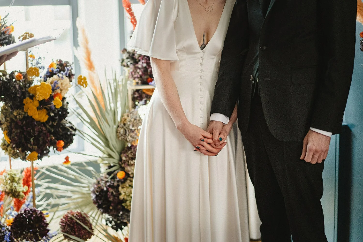  Kathryn and ChrisÕs wedding was supposed to be in Babel rooftop but it burned down 4 days before they were due to get married.  Instead they had their humanist wedding in their own house followed by photos in nearby Ormeau Park and Belfast Cathedral